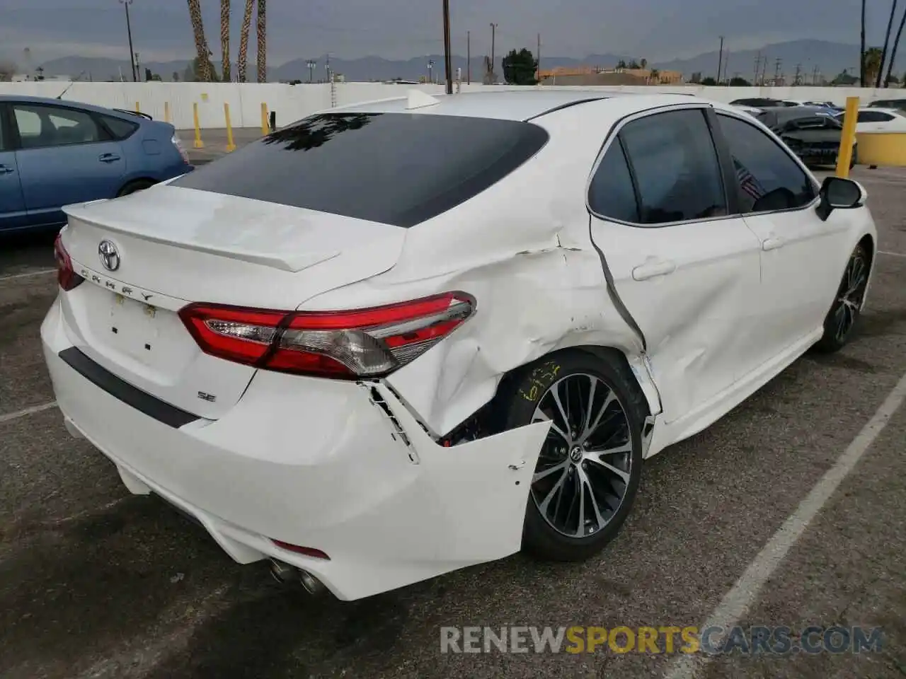 4 Photograph of a damaged car 4T1B11HK1KU796993 TOYOTA CAMRY 2019