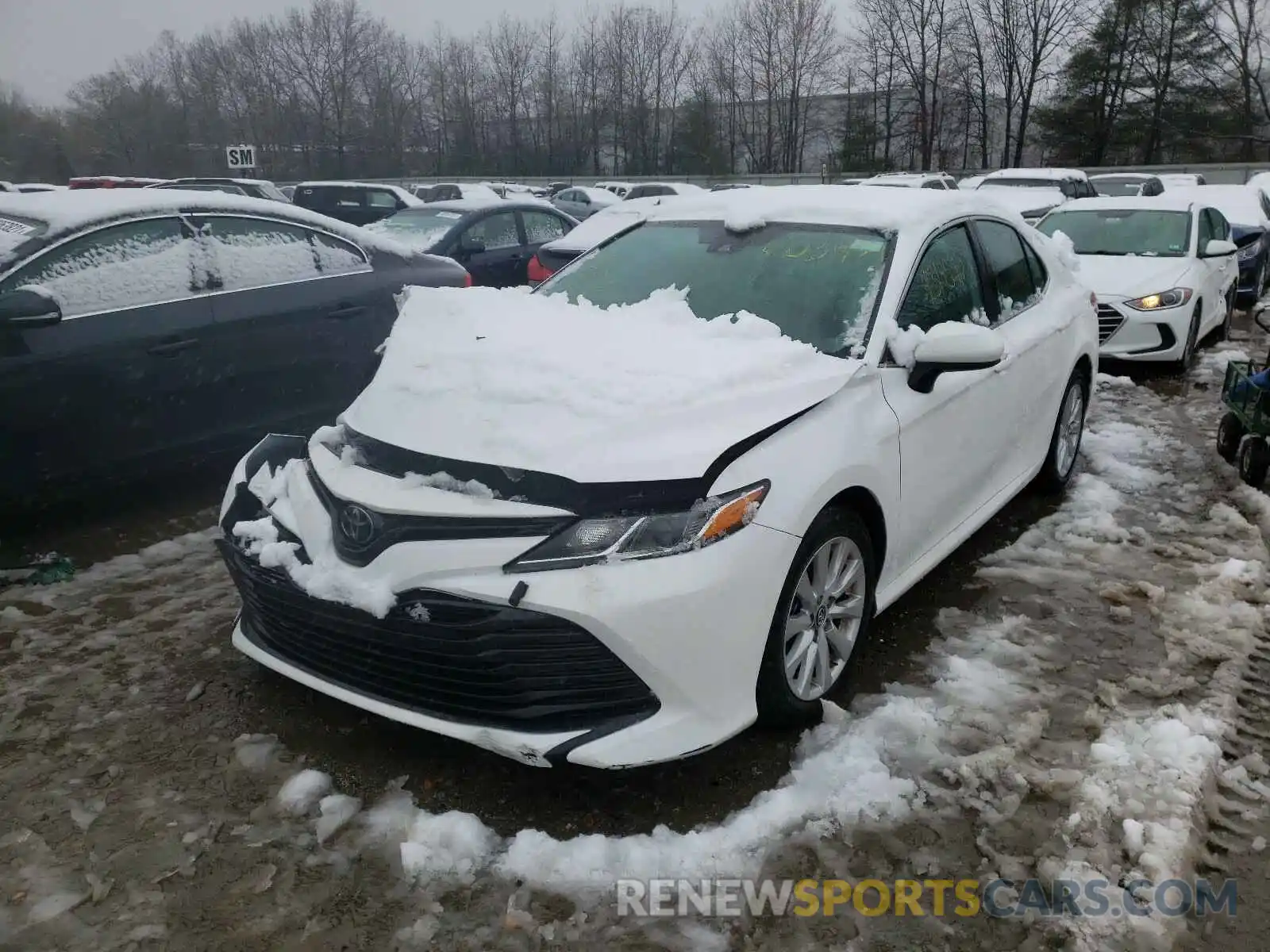 2 Photograph of a damaged car 4T1B11HK1KU801724 TOYOTA CAMRY 2019