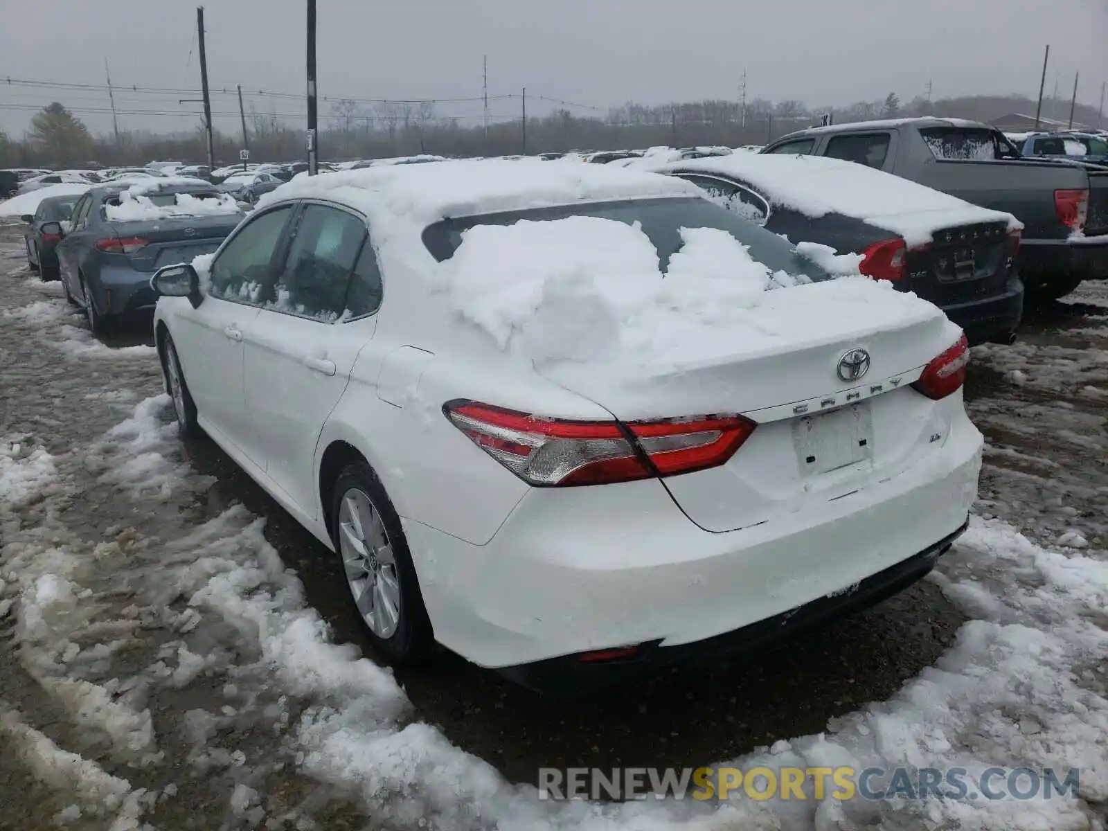 3 Photograph of a damaged car 4T1B11HK1KU801724 TOYOTA CAMRY 2019