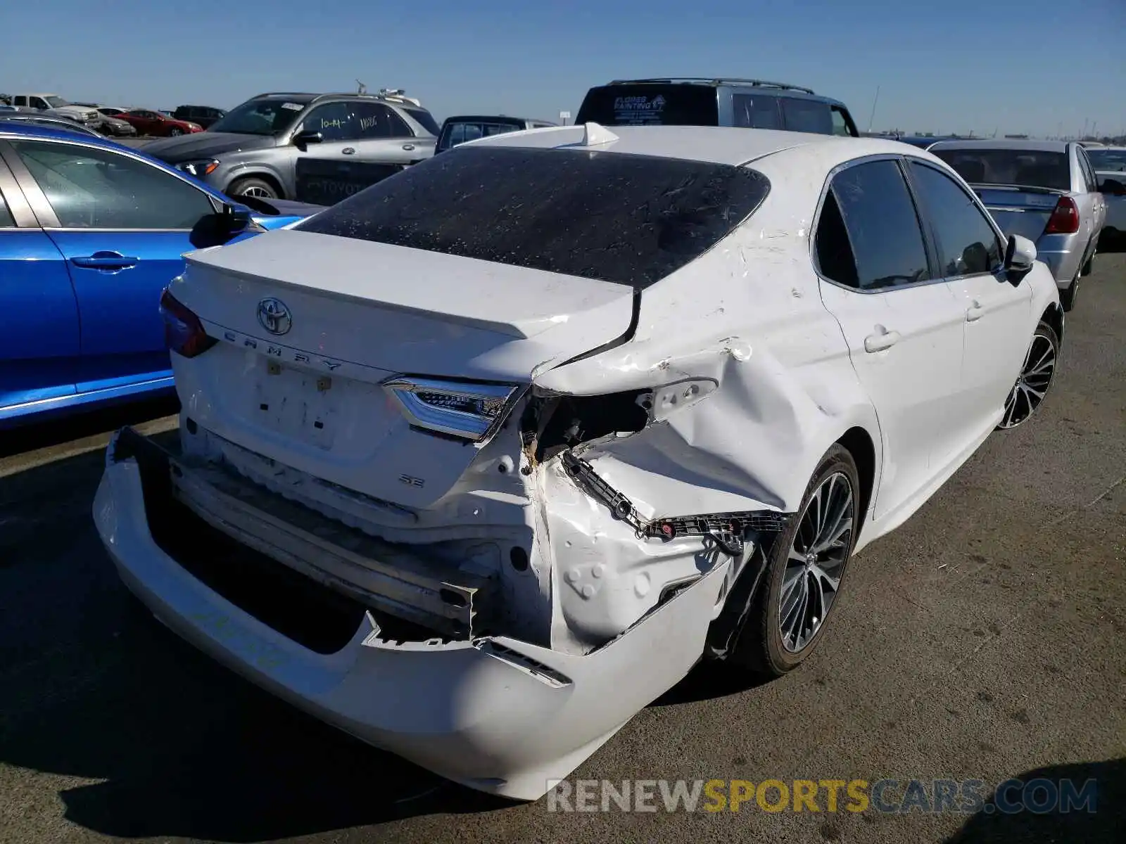 4 Photograph of a damaged car 4T1B11HK1KU802131 TOYOTA CAMRY 2019