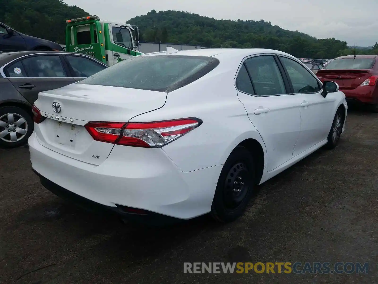 4 Photograph of a damaged car 4T1B11HK1KU803411 TOYOTA CAMRY 2019