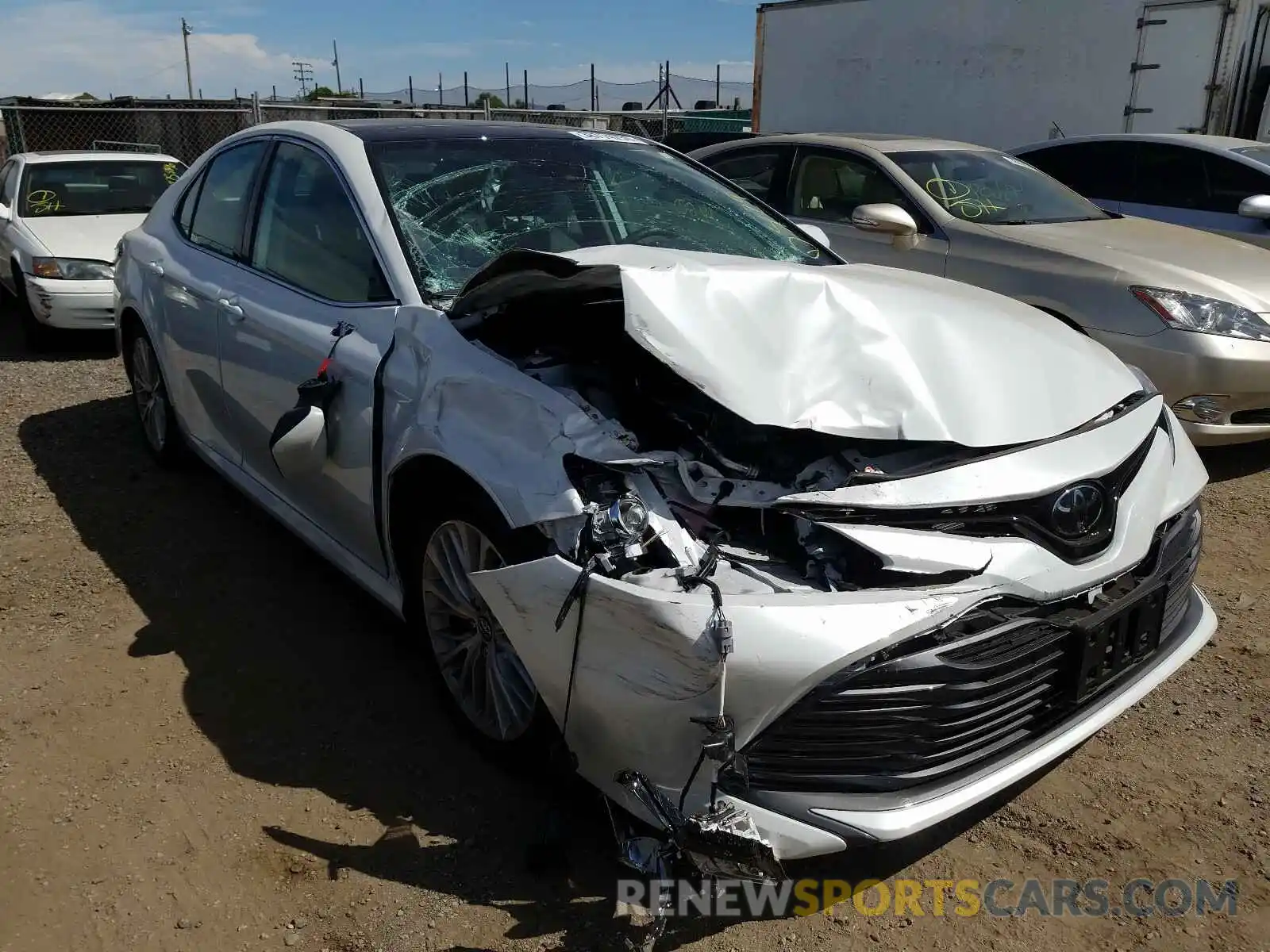 1 Photograph of a damaged car 4T1B11HK1KU813064 TOYOTA CAMRY 2019