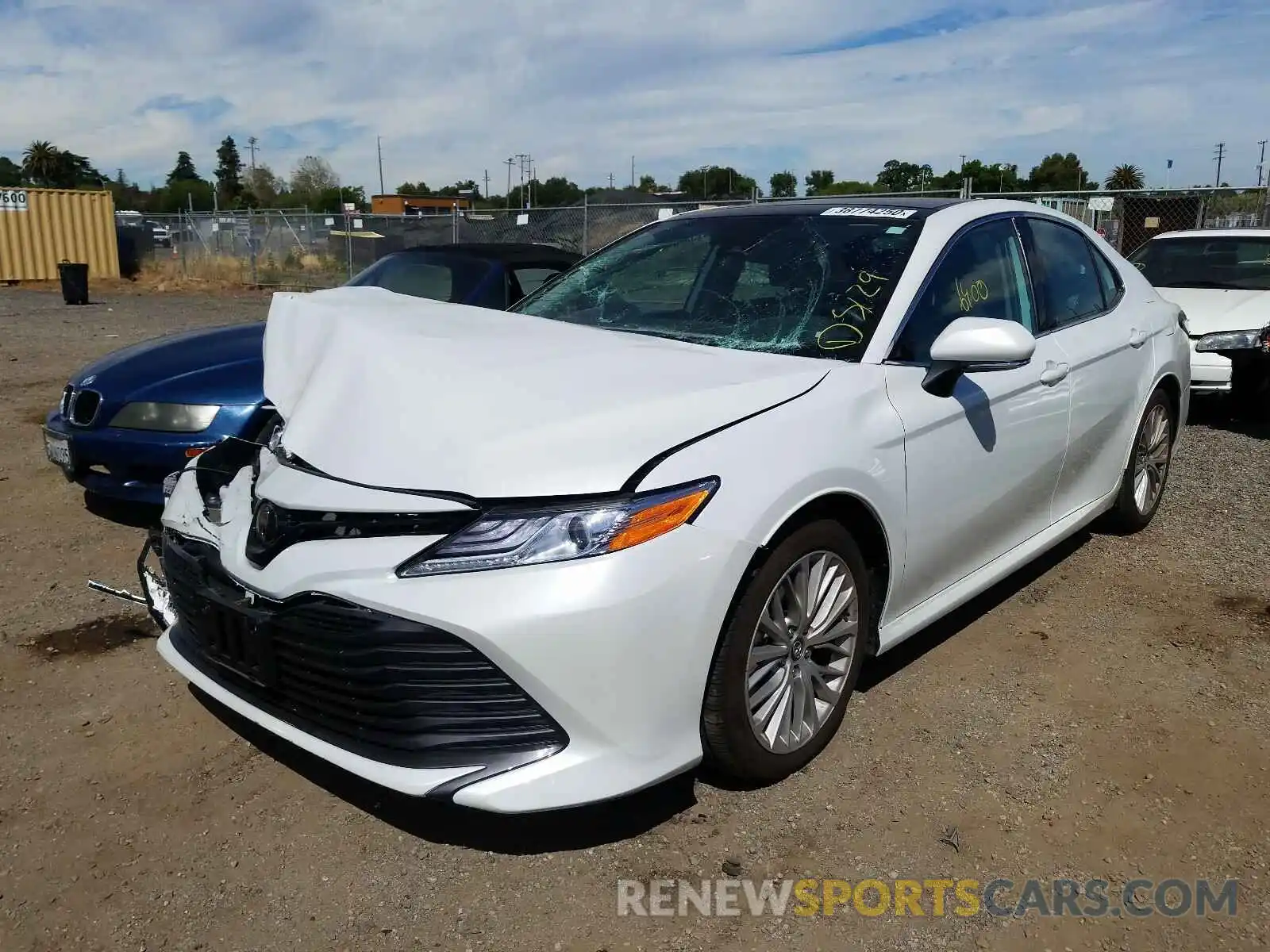 2 Photograph of a damaged car 4T1B11HK1KU813064 TOYOTA CAMRY 2019