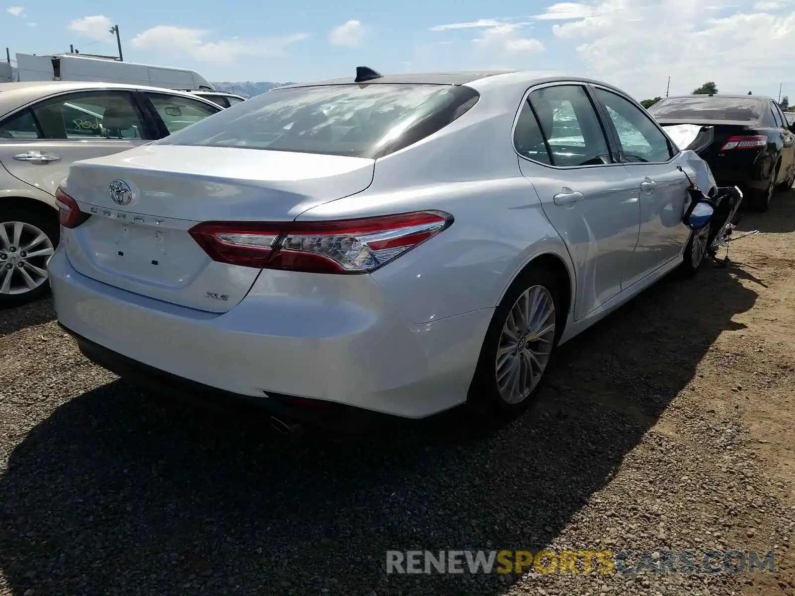 4 Photograph of a damaged car 4T1B11HK1KU813064 TOYOTA CAMRY 2019