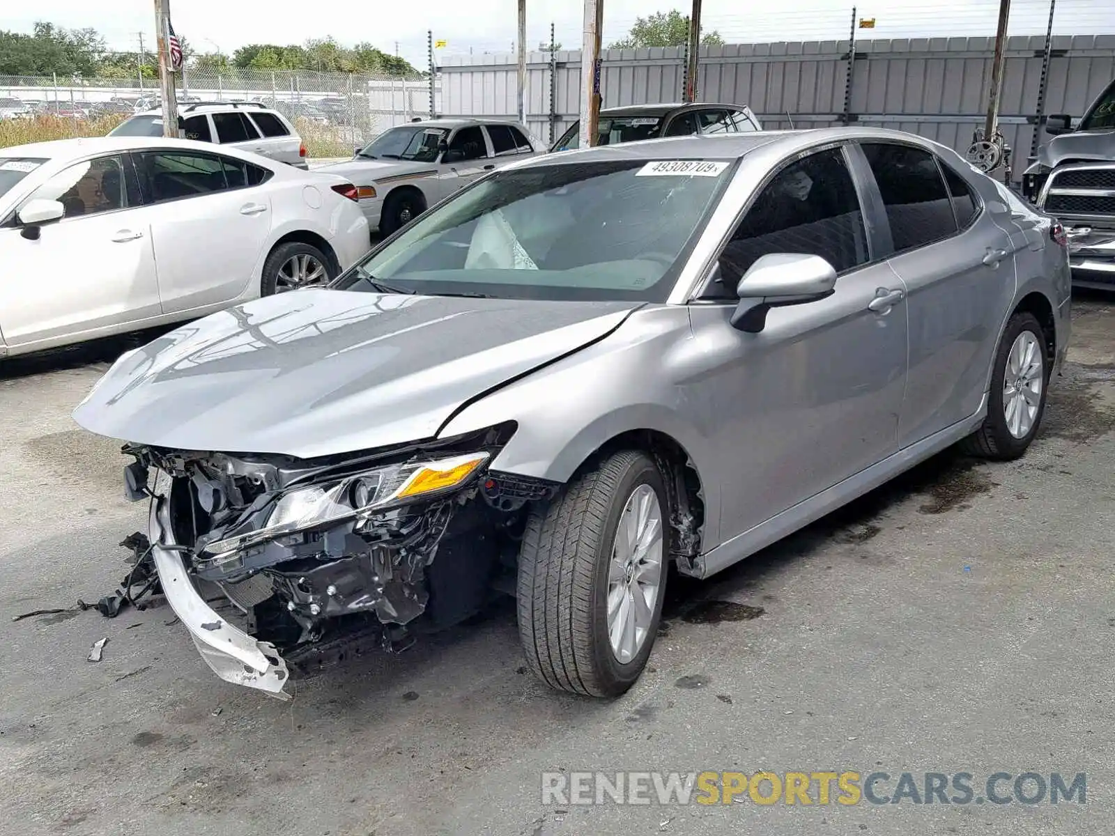 2 Photograph of a damaged car 4T1B11HK1KU816854 TOYOTA CAMRY 2019