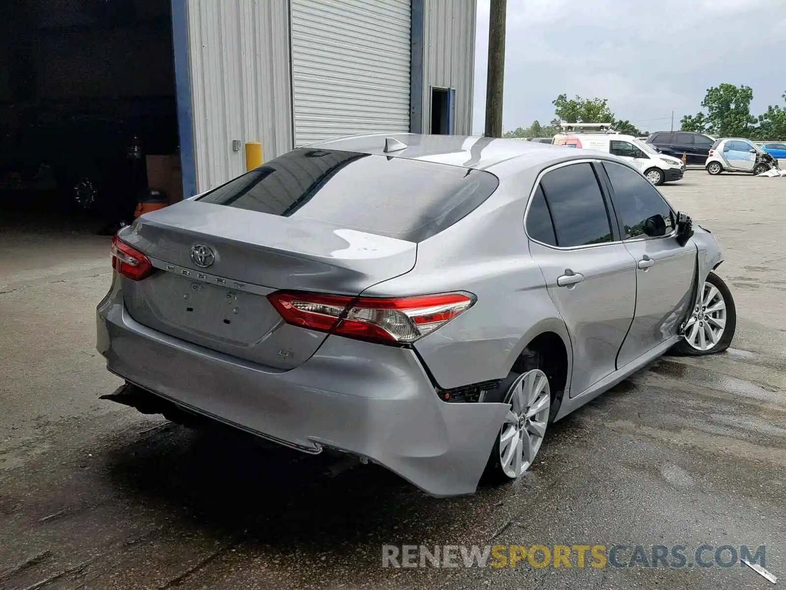 4 Photograph of a damaged car 4T1B11HK1KU816854 TOYOTA CAMRY 2019