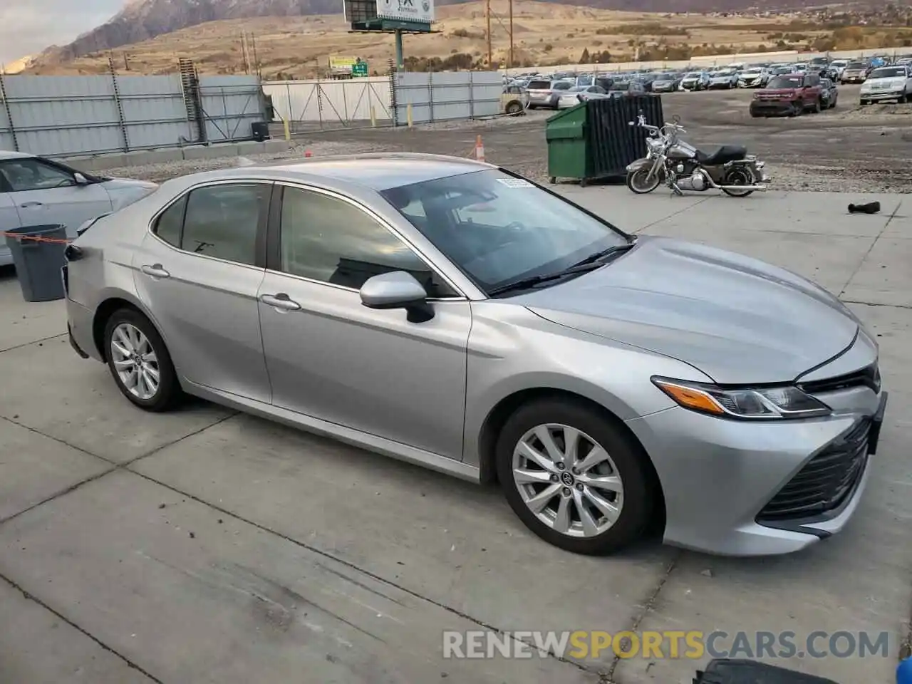 4 Photograph of a damaged car 4T1B11HK1KU826025 TOYOTA CAMRY 2019