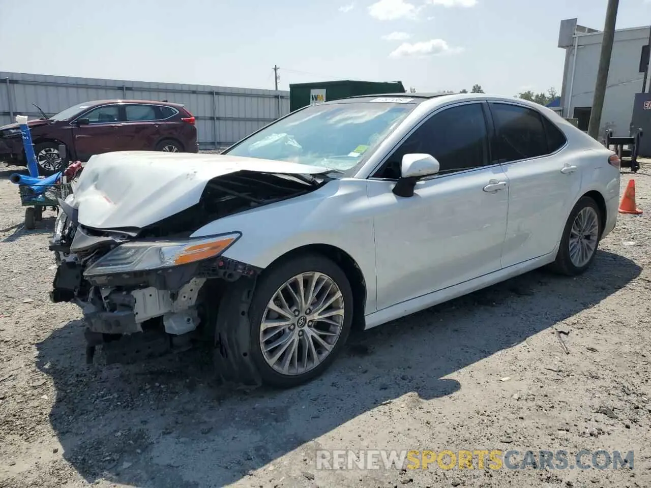 1 Photograph of a damaged car 4T1B11HK1KU829233 TOYOTA CAMRY 2019