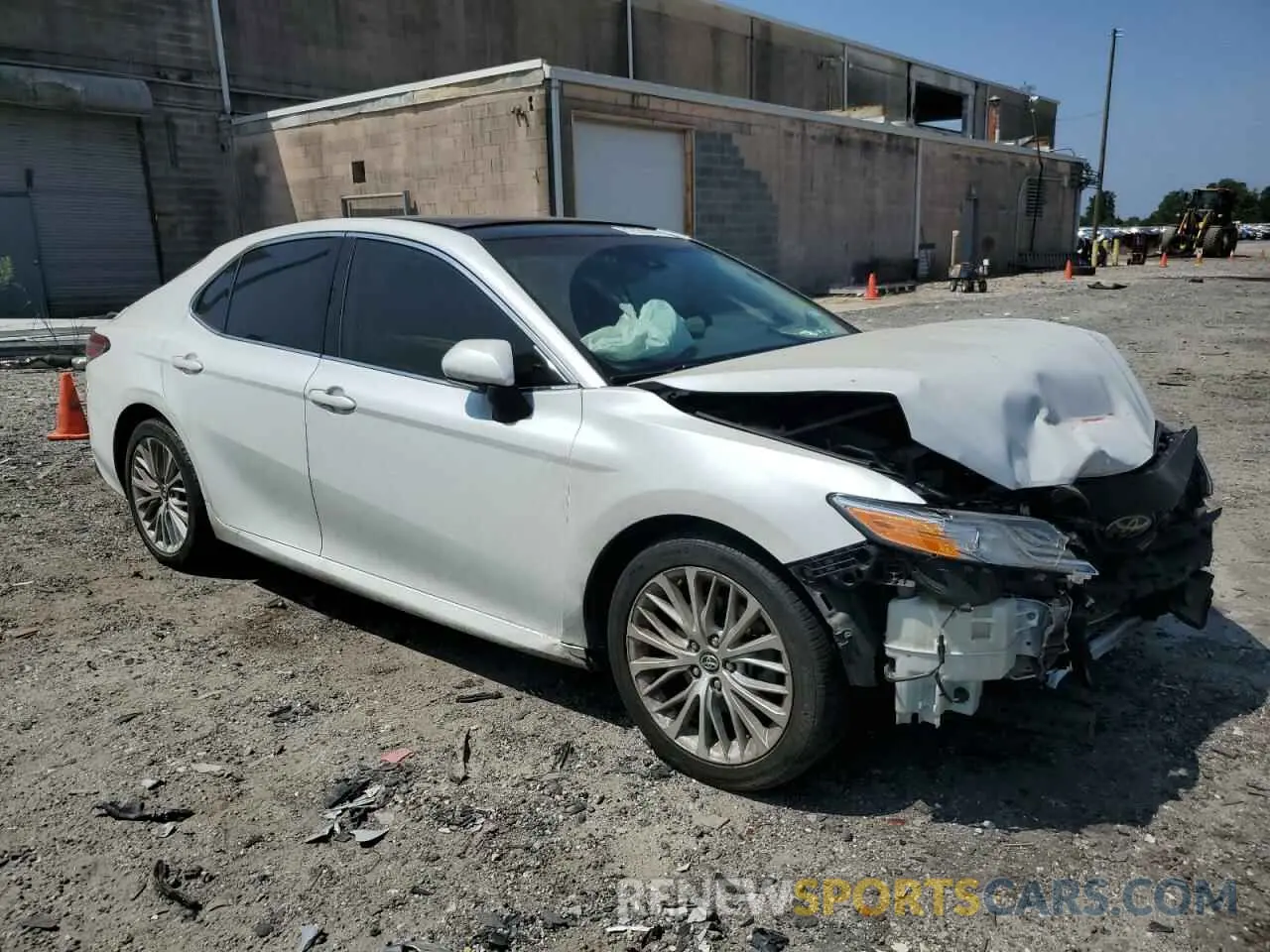 4 Photograph of a damaged car 4T1B11HK1KU829233 TOYOTA CAMRY 2019