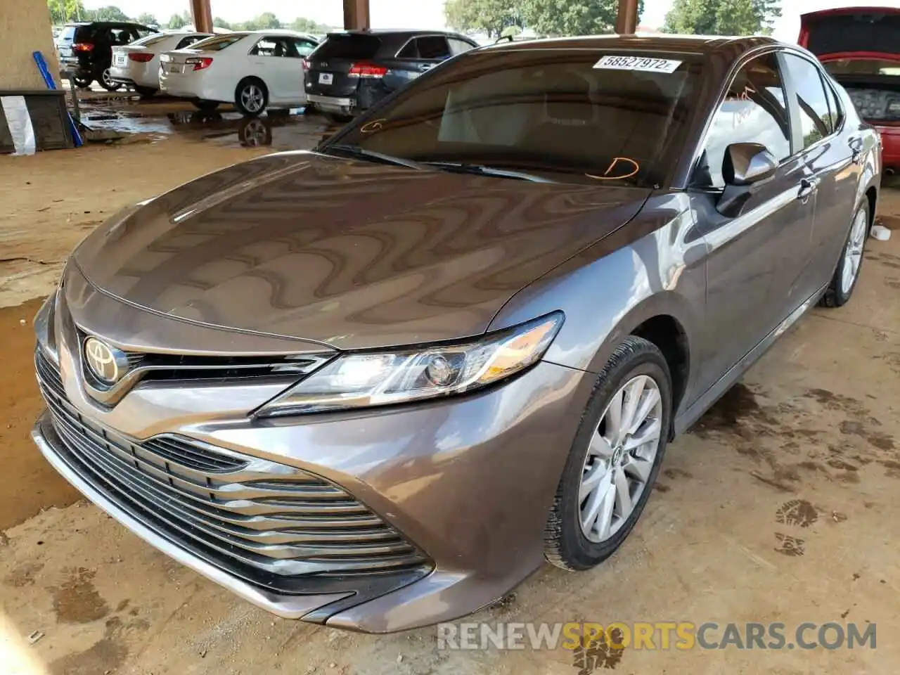 2 Photograph of a damaged car 4T1B11HK1KU830673 TOYOTA CAMRY 2019