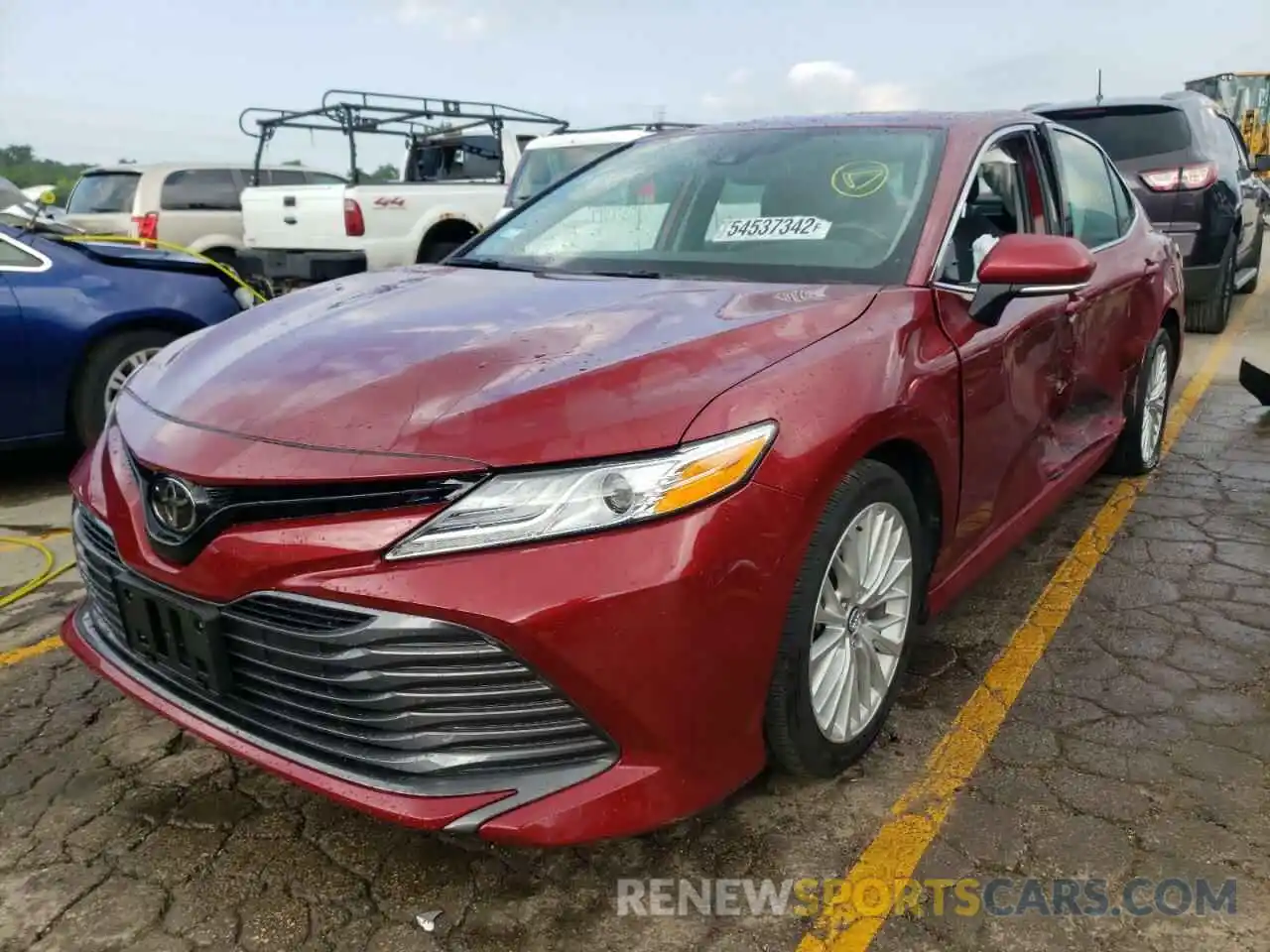 2 Photograph of a damaged car 4T1B11HK1KU831628 TOYOTA CAMRY 2019