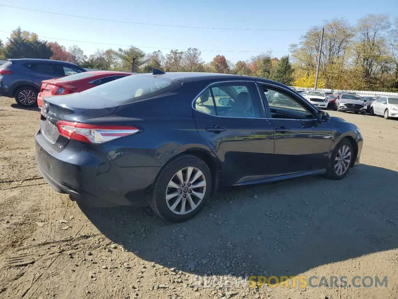 3 Photograph of a damaged car 4T1B11HK1KU834173 TOYOTA CAMRY 2019