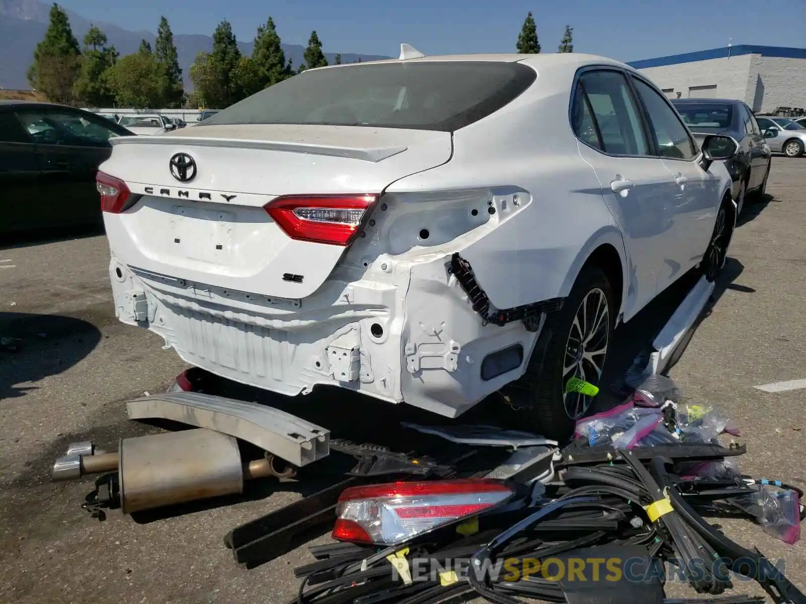 4 Photograph of a damaged car 4T1B11HK1KU853483 TOYOTA CAMRY 2019