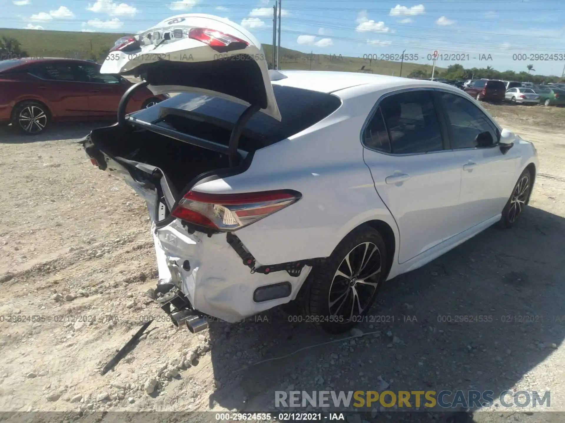 4 Photograph of a damaged car 4T1B11HK2KU182602 TOYOTA CAMRY 2019