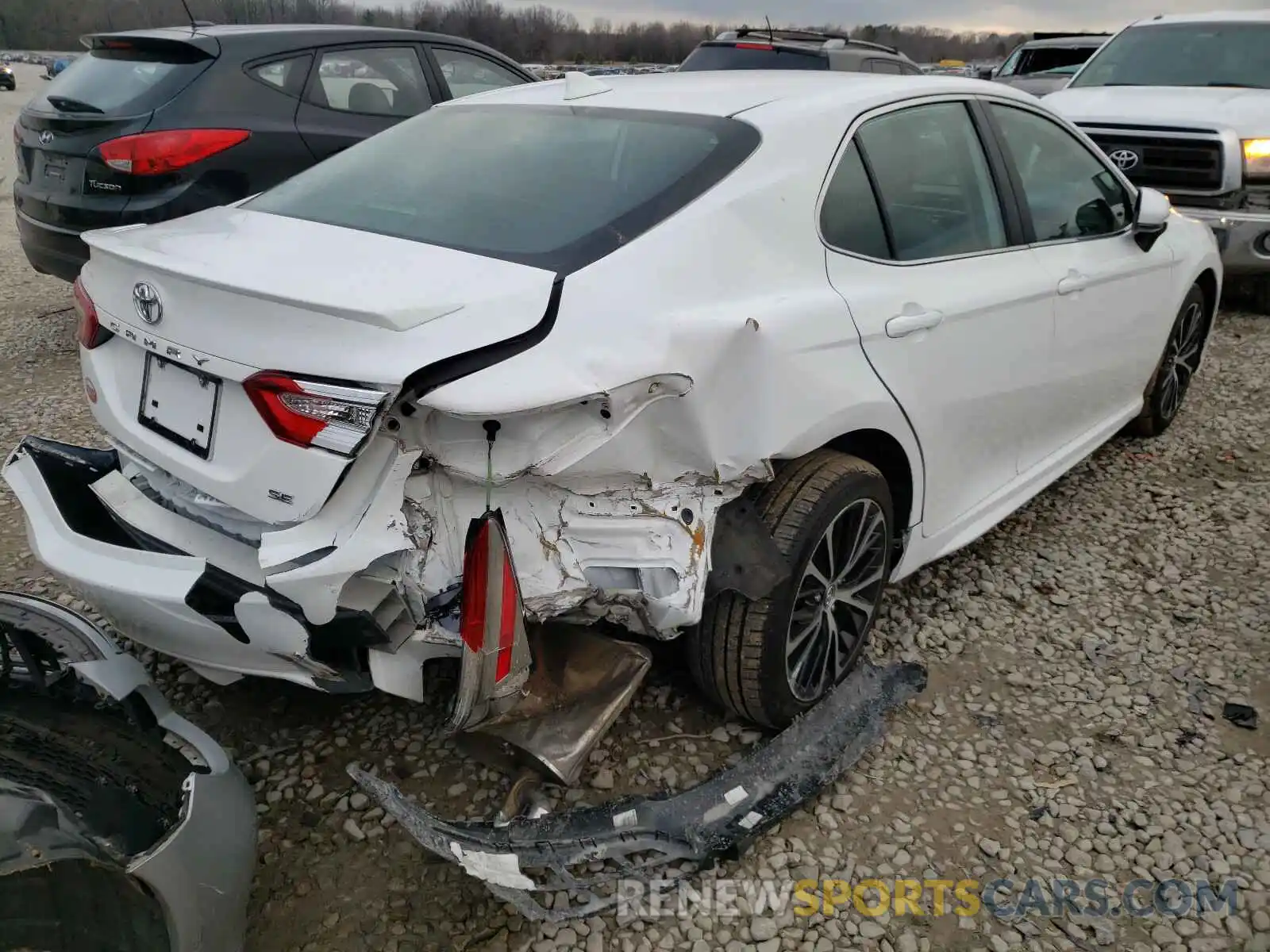 4 Photograph of a damaged car 4T1B11HK2KU215601 TOYOTA CAMRY 2019