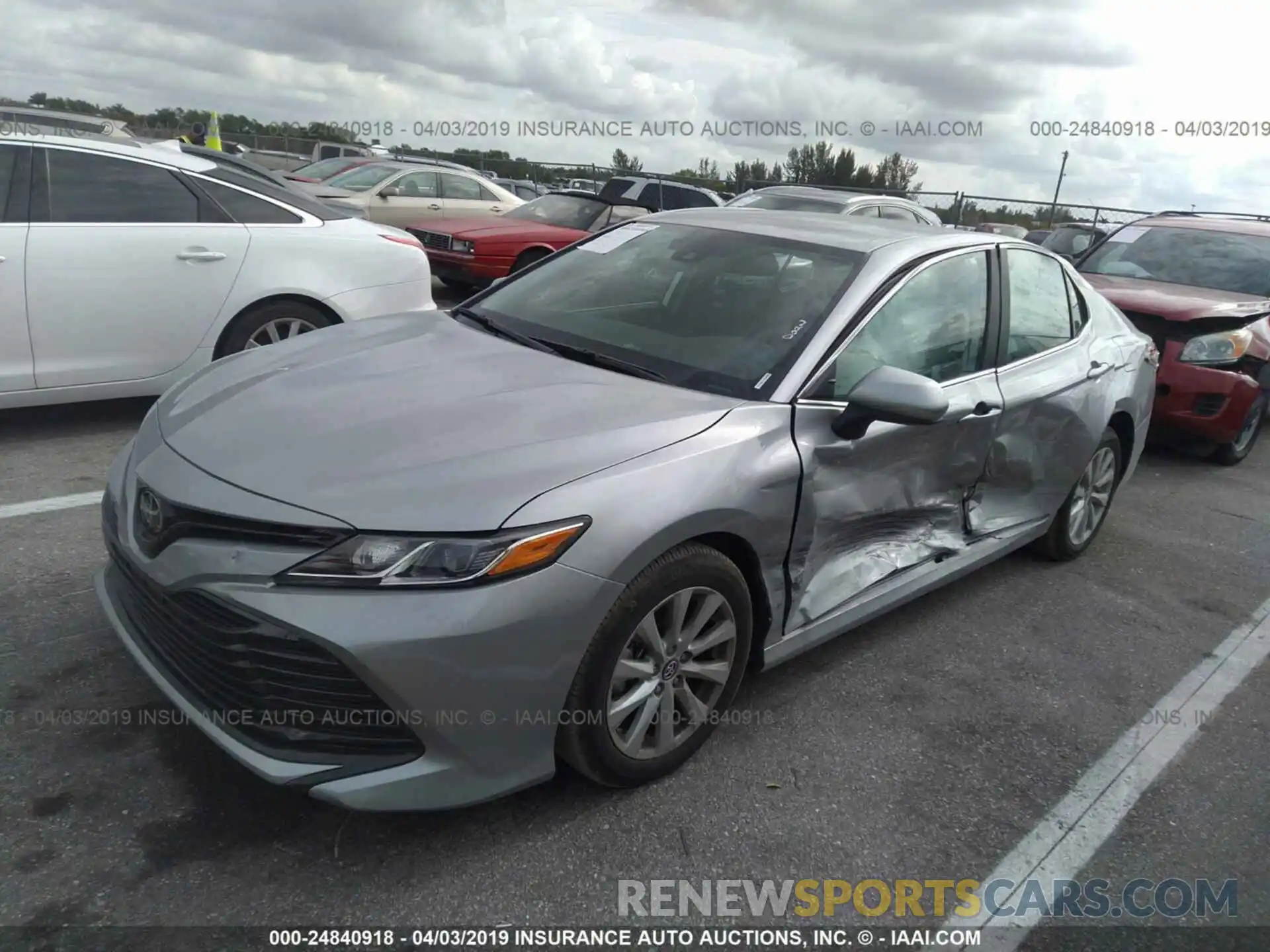 2 Photograph of a damaged car 4T1B11HK2KU217395 TOYOTA CAMRY 2019