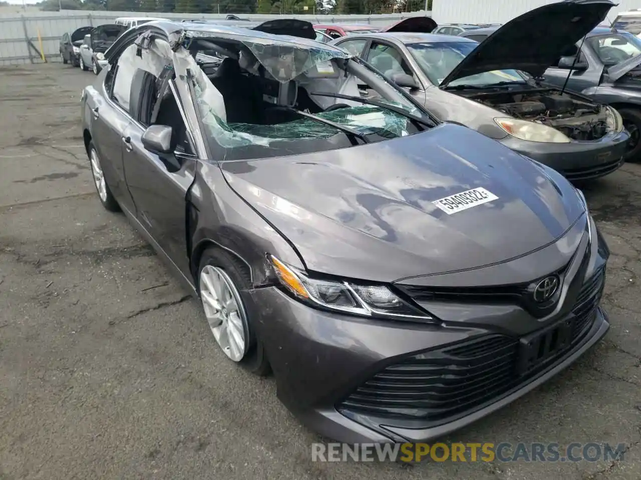 1 Photograph of a damaged car 4T1B11HK2KU219955 TOYOTA CAMRY 2019