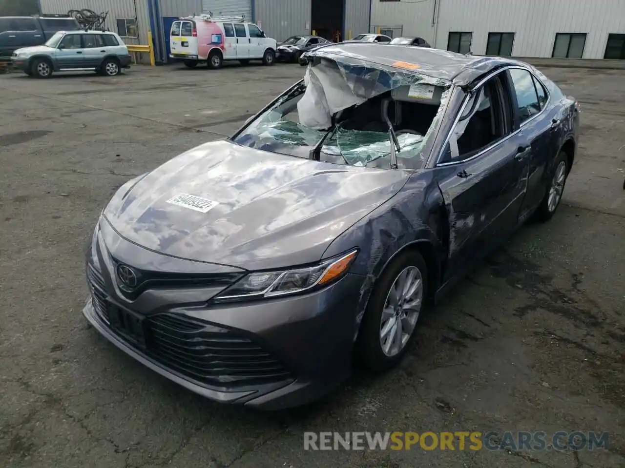 2 Photograph of a damaged car 4T1B11HK2KU219955 TOYOTA CAMRY 2019