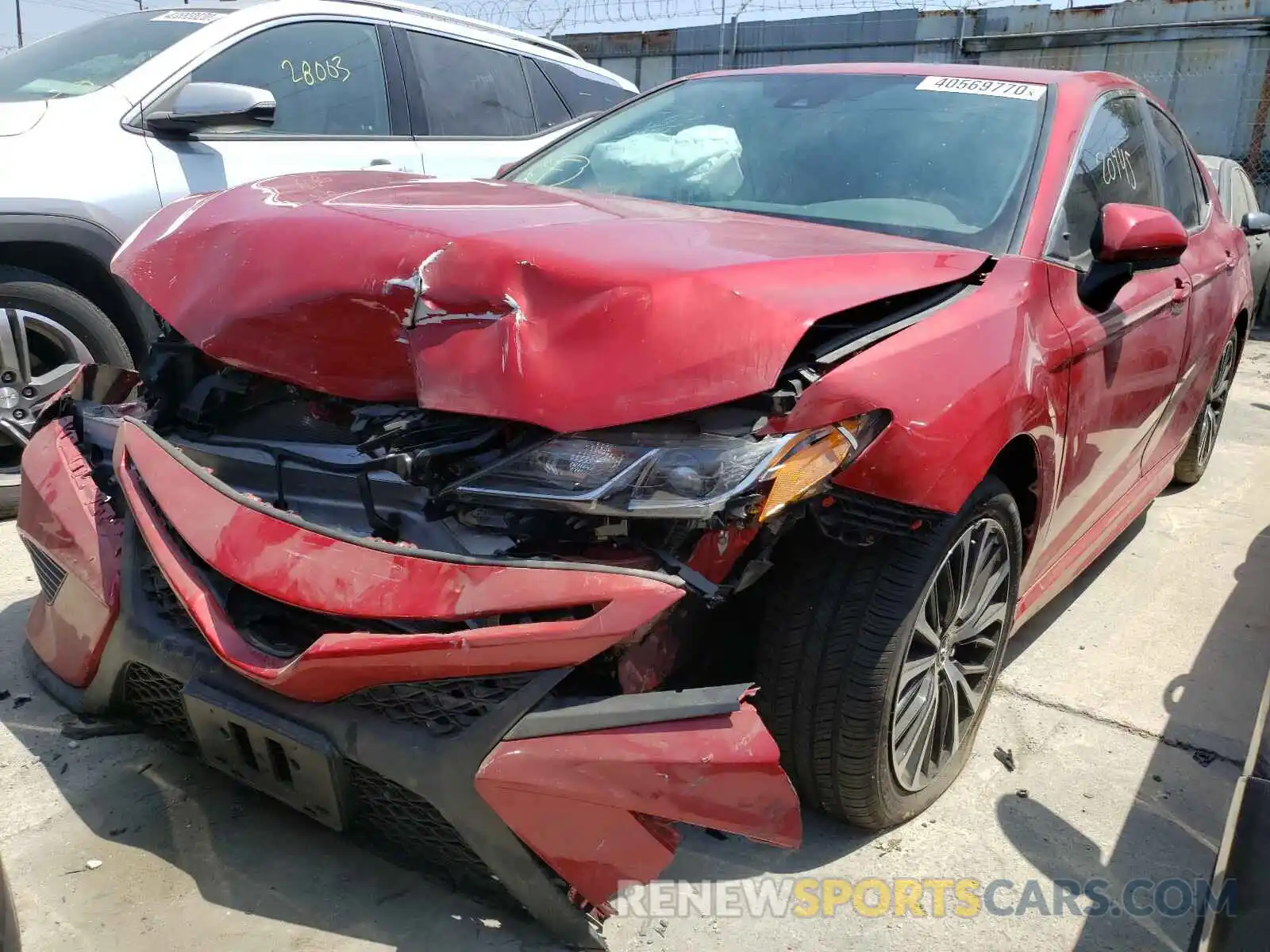 2 Photograph of a damaged car 4T1B11HK2KU226789 TOYOTA CAMRY 2019