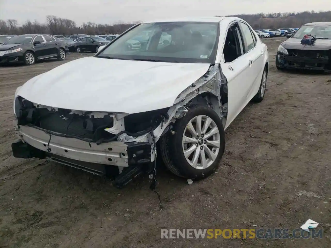 2 Photograph of a damaged car 4T1B11HK2KU243964 TOYOTA CAMRY 2019