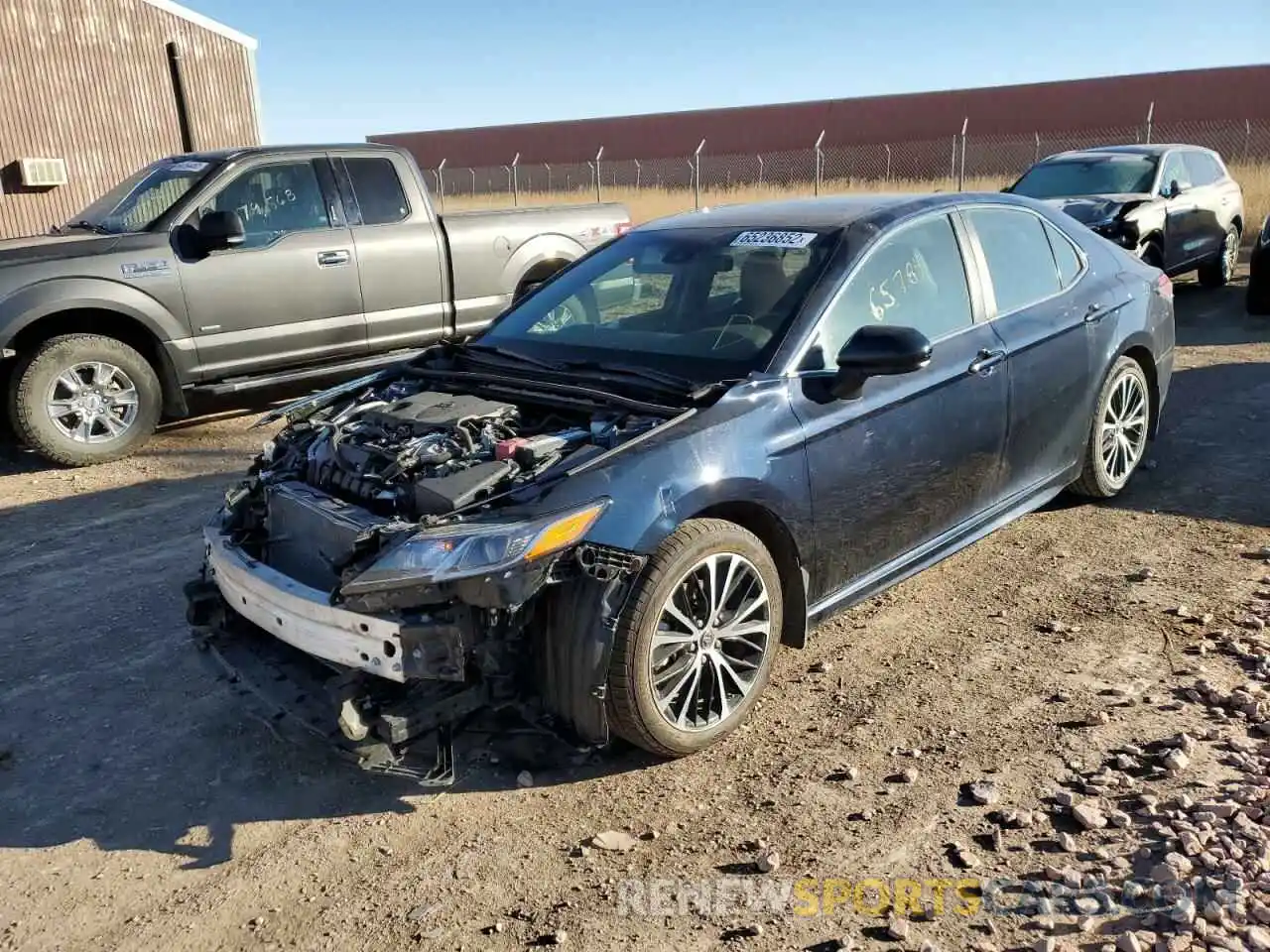 2 Photograph of a damaged car 4T1B11HK2KU258996 TOYOTA CAMRY 2019