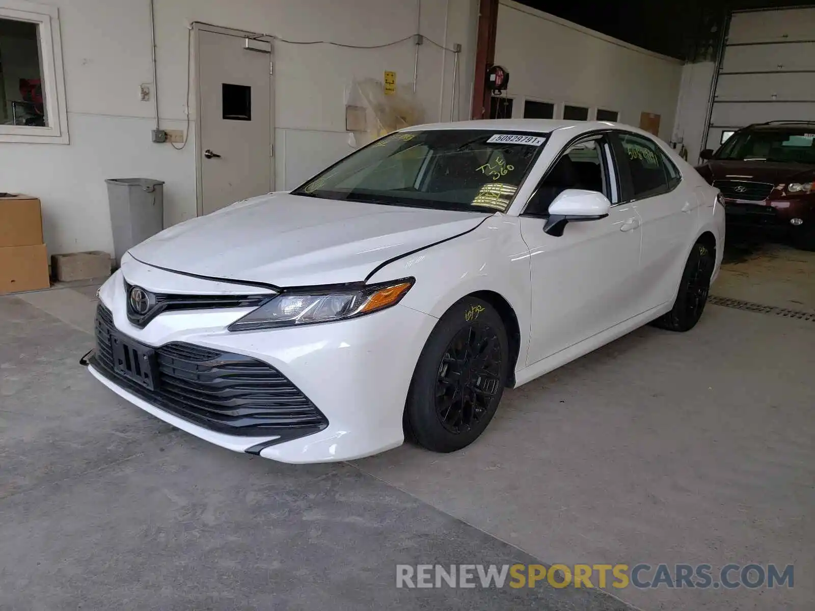 2 Photograph of a damaged car 4T1B11HK2KU263180 TOYOTA CAMRY 2019