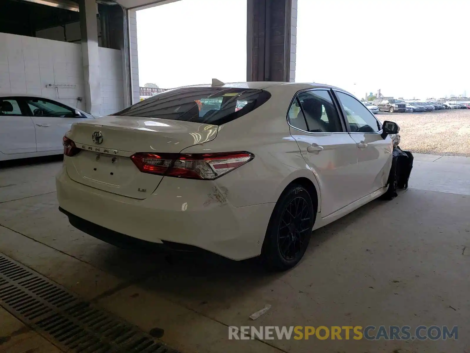 4 Photograph of a damaged car 4T1B11HK2KU263180 TOYOTA CAMRY 2019