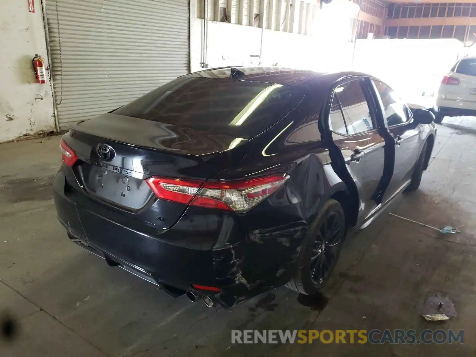 4 Photograph of a damaged car 4T1B11HK2KU263521 TOYOTA CAMRY 2019