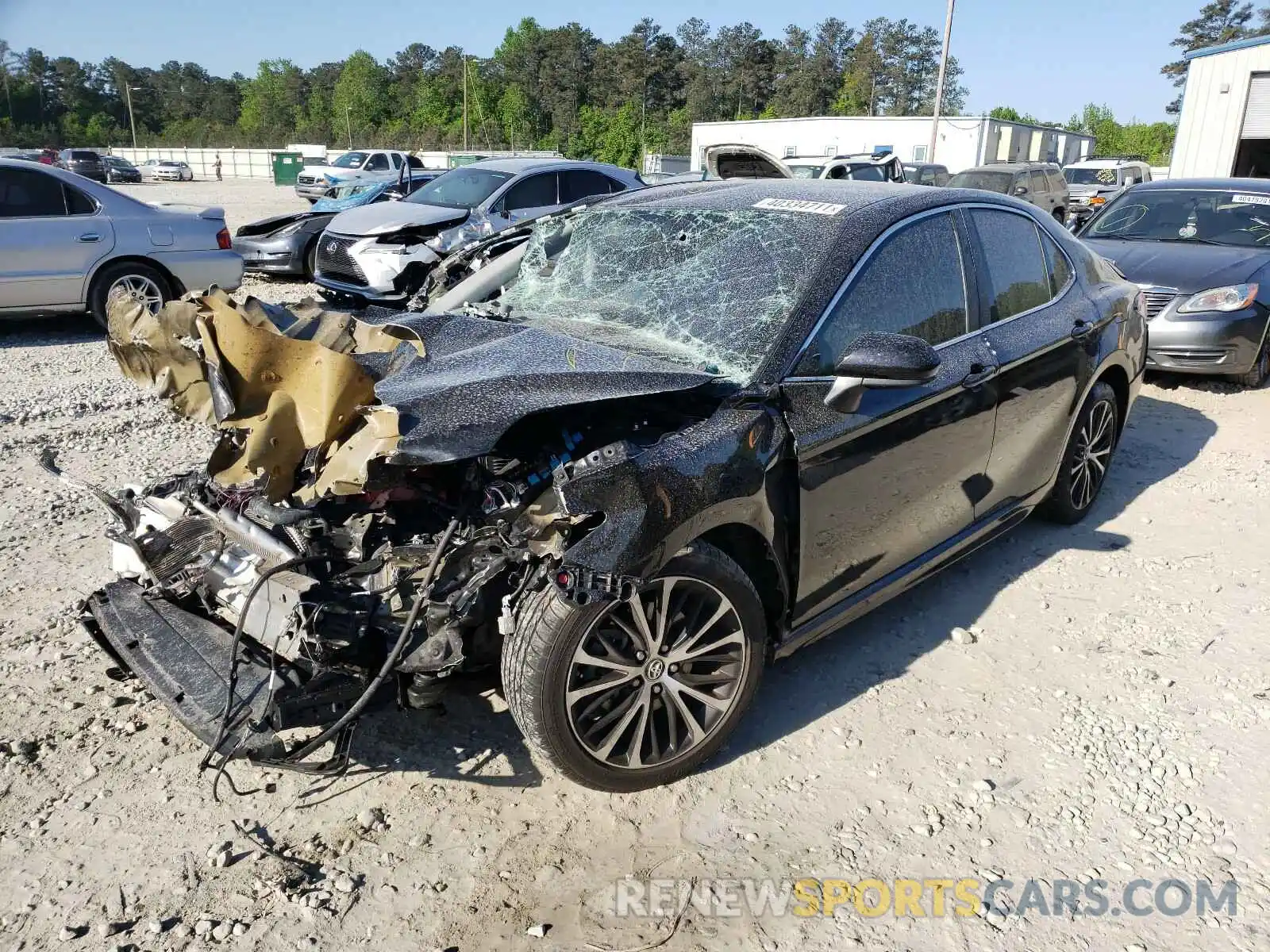 2 Photograph of a damaged car 4T1B11HK2KU281663 TOYOTA CAMRY 2019