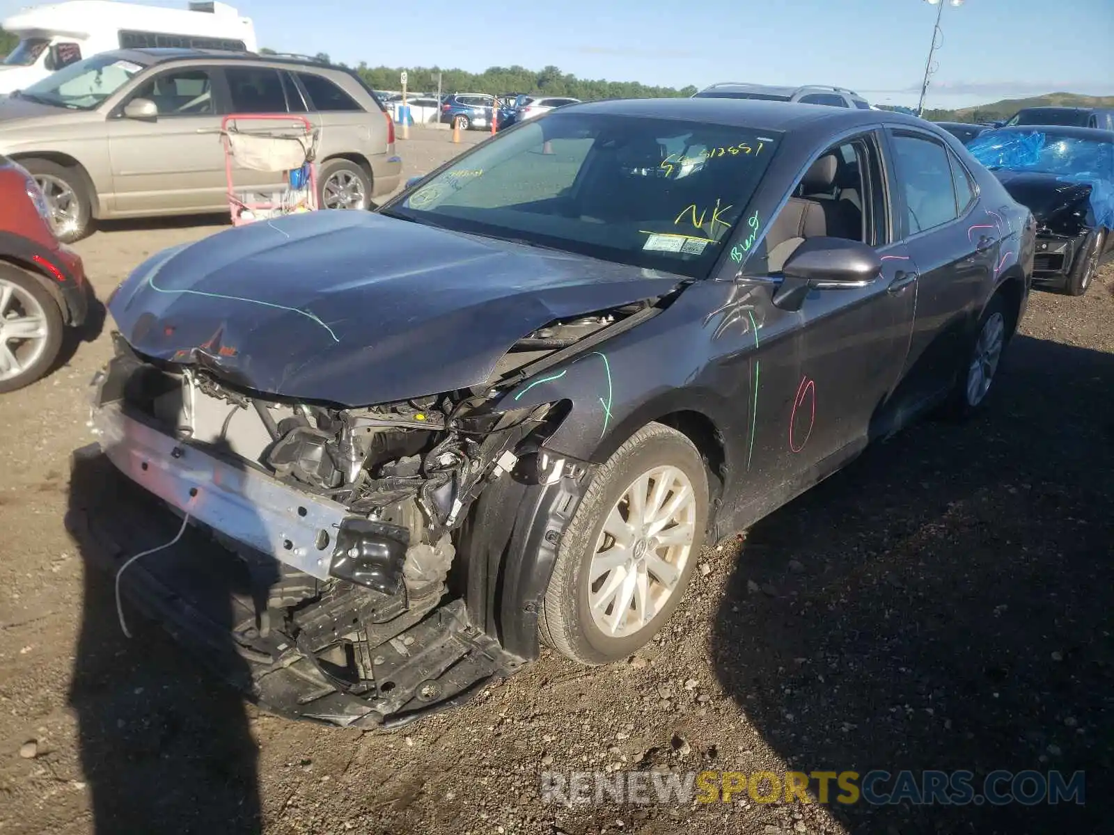 2 Photograph of a damaged car 4T1B11HK2KU686213 TOYOTA CAMRY 2019