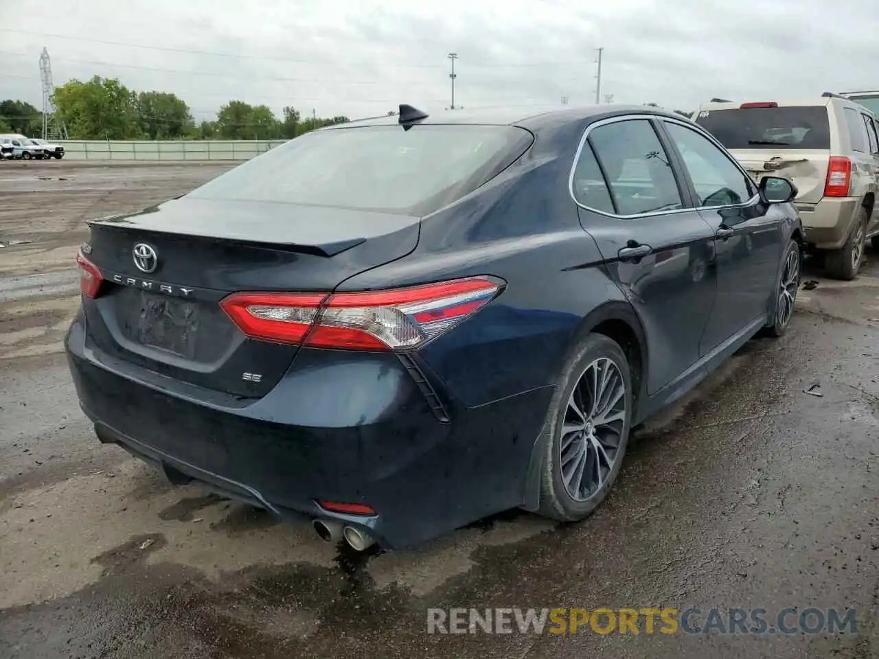 4 Photograph of a damaged car 4T1B11HK2KU700272 TOYOTA CAMRY 2019