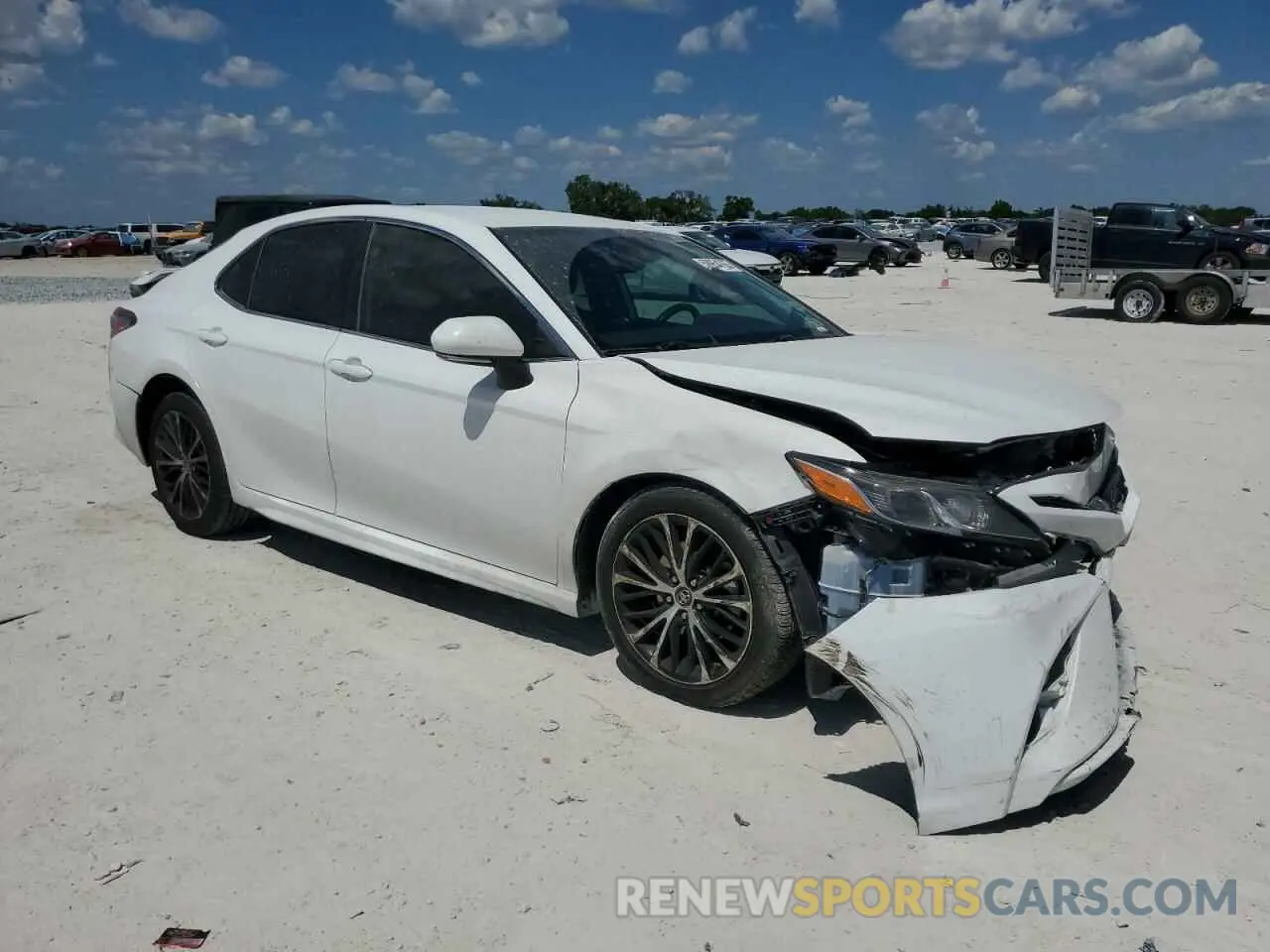 4 Photograph of a damaged car 4T1B11HK2KU703169 TOYOTA CAMRY 2019