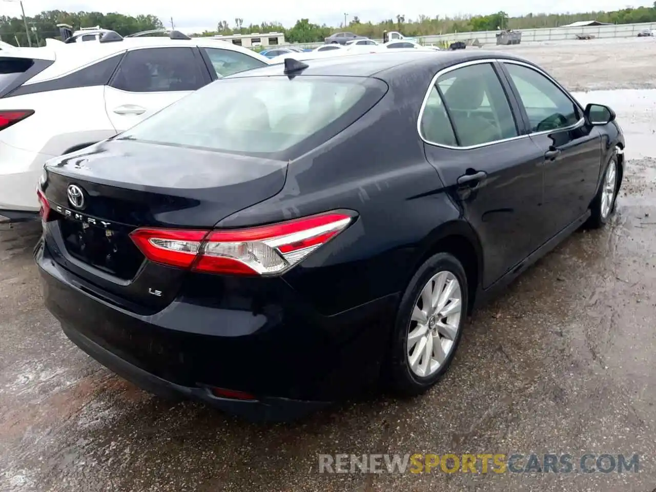 4 Photograph of a damaged car 4T1B11HK2KU704547 TOYOTA CAMRY 2019