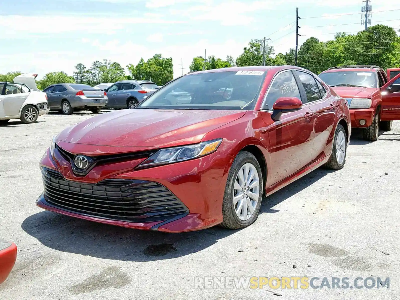 2 Photograph of a damaged car 4T1B11HK2KU711983 TOYOTA CAMRY 2019