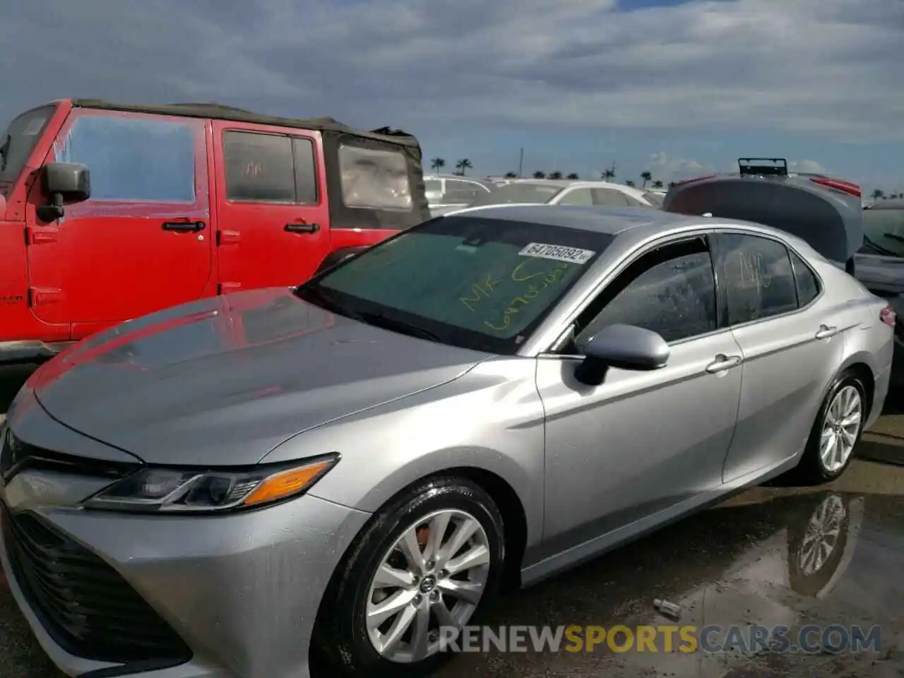 2 Photograph of a damaged car 4T1B11HK2KU713765 TOYOTA CAMRY 2019