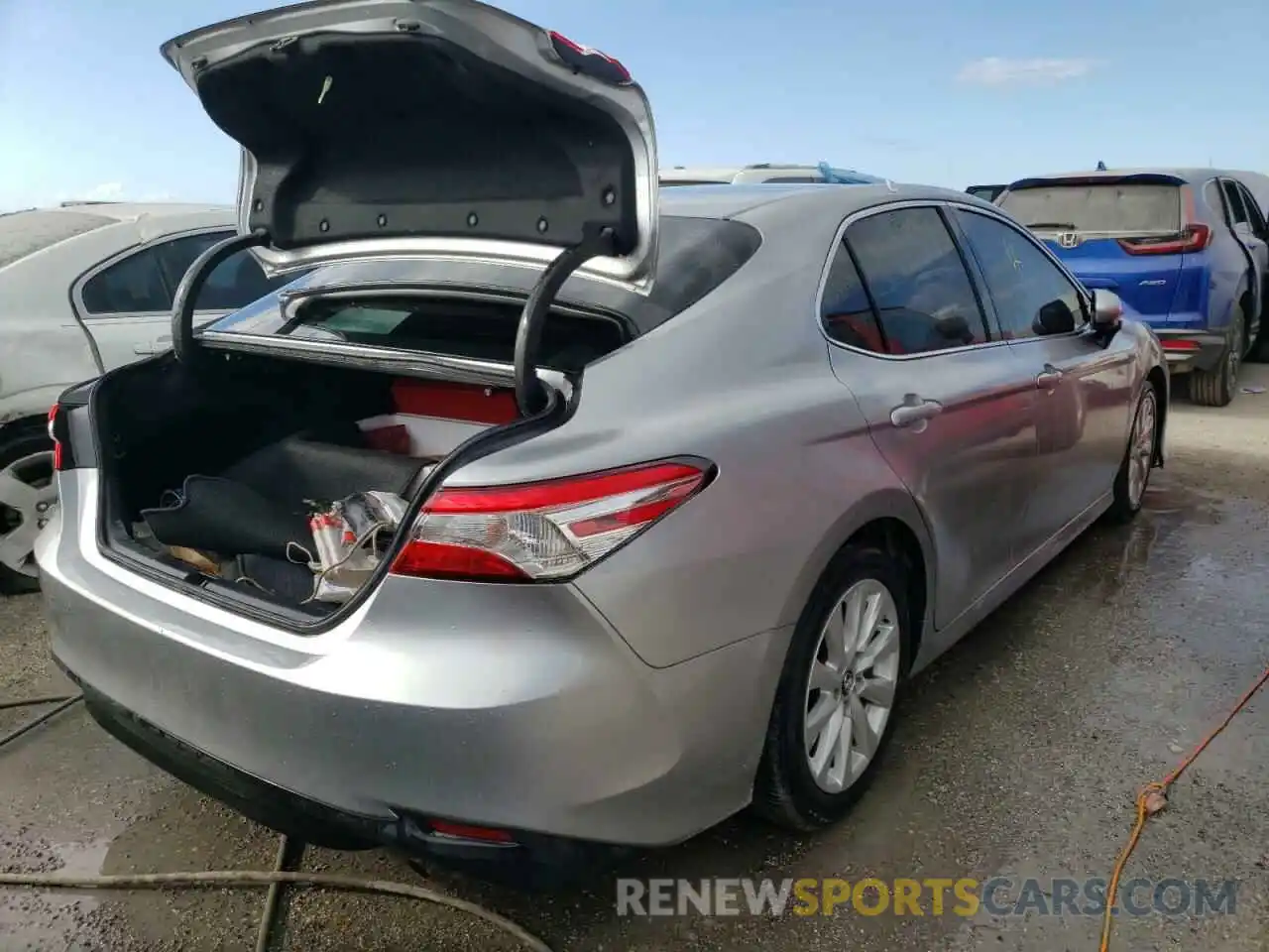 4 Photograph of a damaged car 4T1B11HK2KU713765 TOYOTA CAMRY 2019