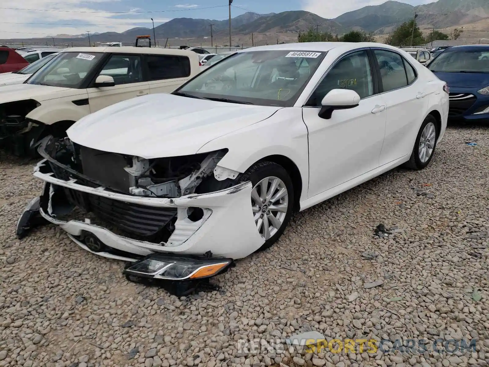 2 Photograph of a damaged car 4T1B11HK2KU718559 TOYOTA CAMRY 2019