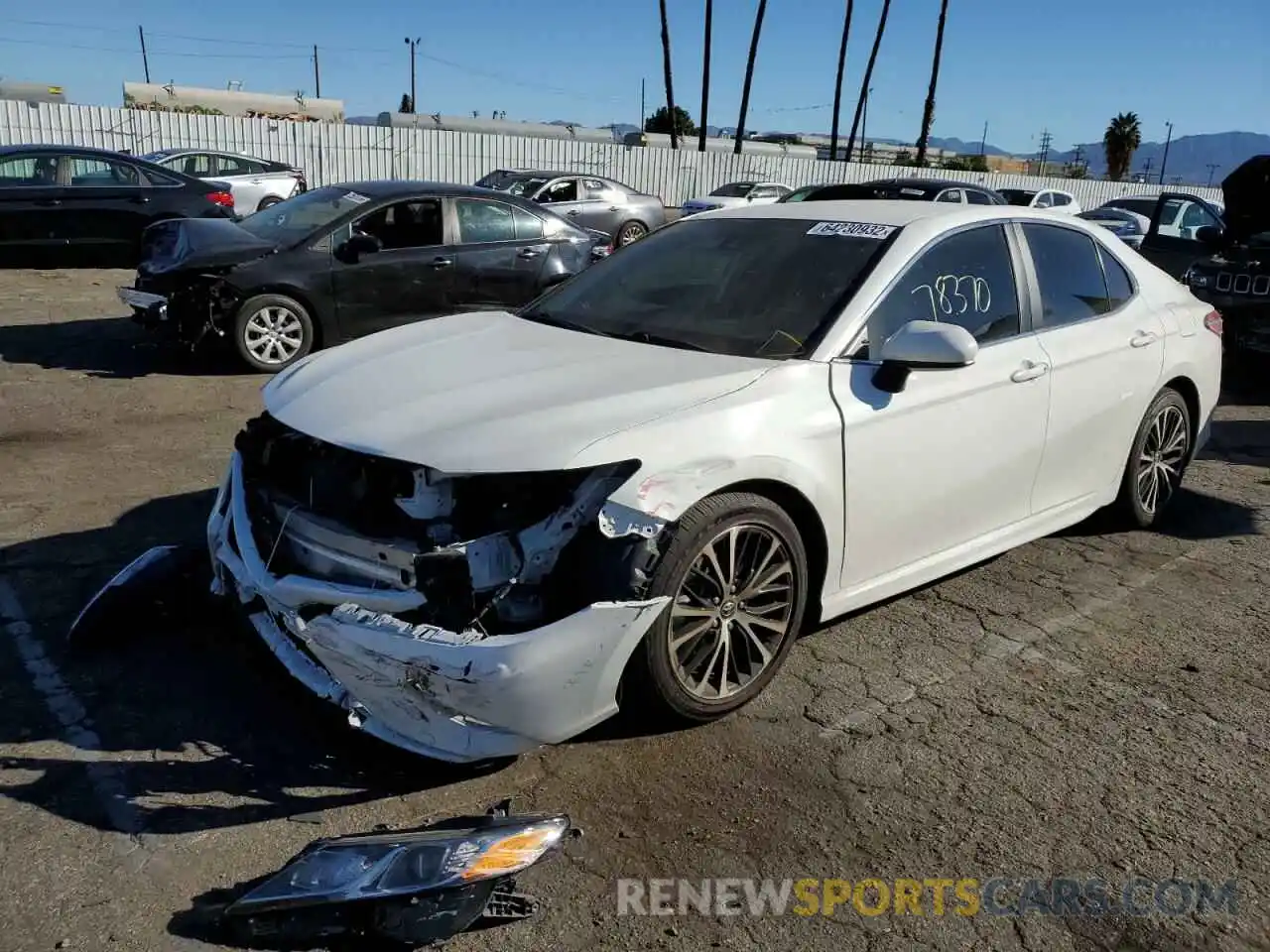 2 Photograph of a damaged car 4T1B11HK2KU719842 TOYOTA CAMRY 2019