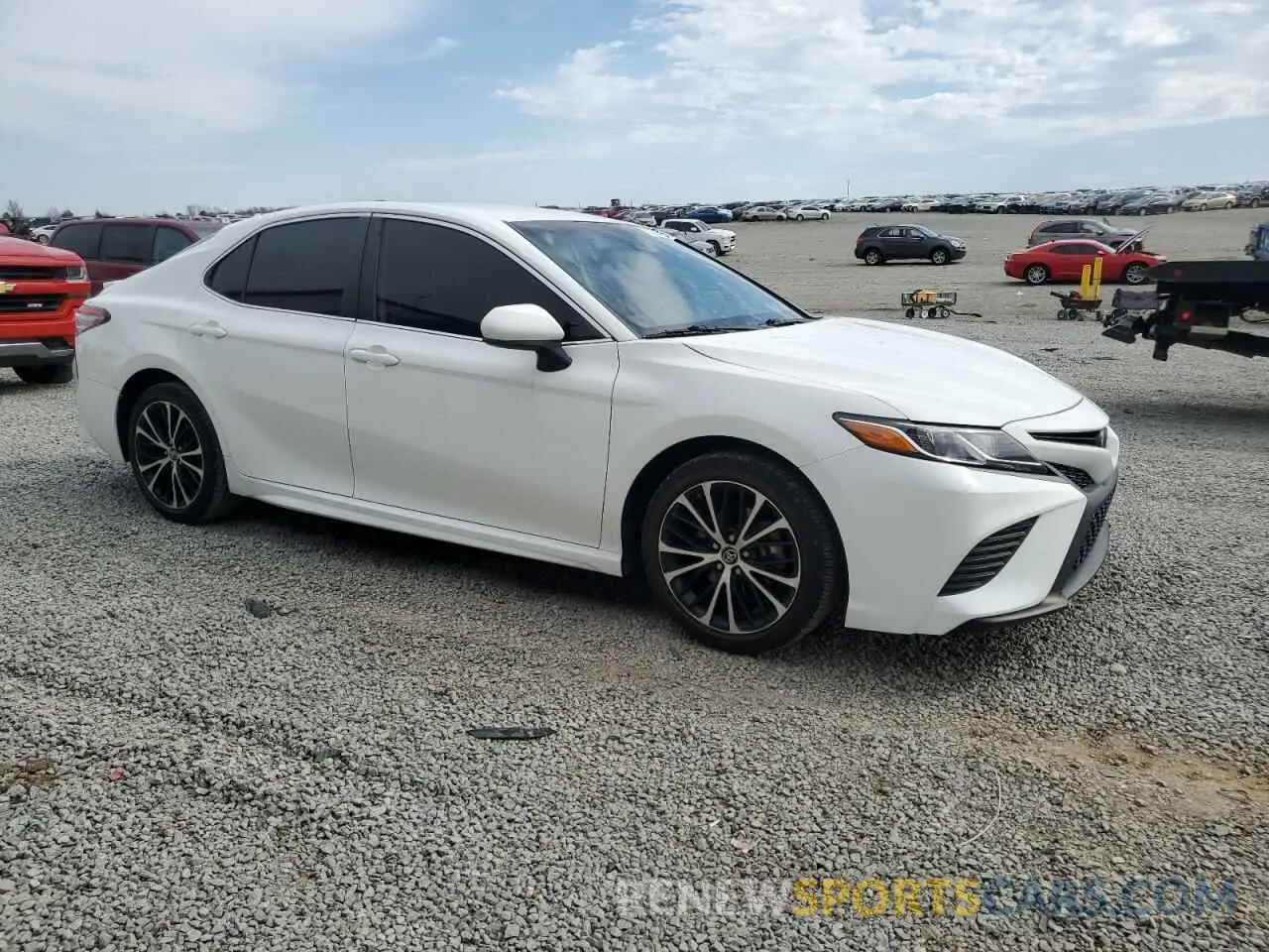 4 Photograph of a damaged car 4T1B11HK2KU724006 TOYOTA CAMRY 2019