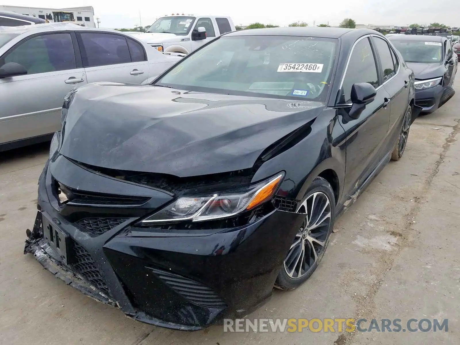2 Photograph of a damaged car 4T1B11HK2KU725009 TOYOTA CAMRY 2019