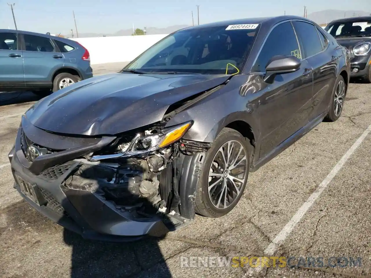 2 Photograph of a damaged car 4T1B11HK2KU728878 TOYOTA CAMRY 2019