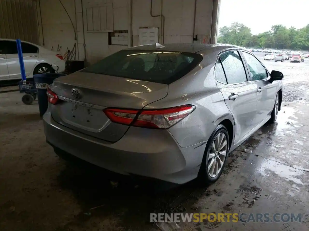 4 Photograph of a damaged car 4T1B11HK2KU743073 TOYOTA CAMRY 2019