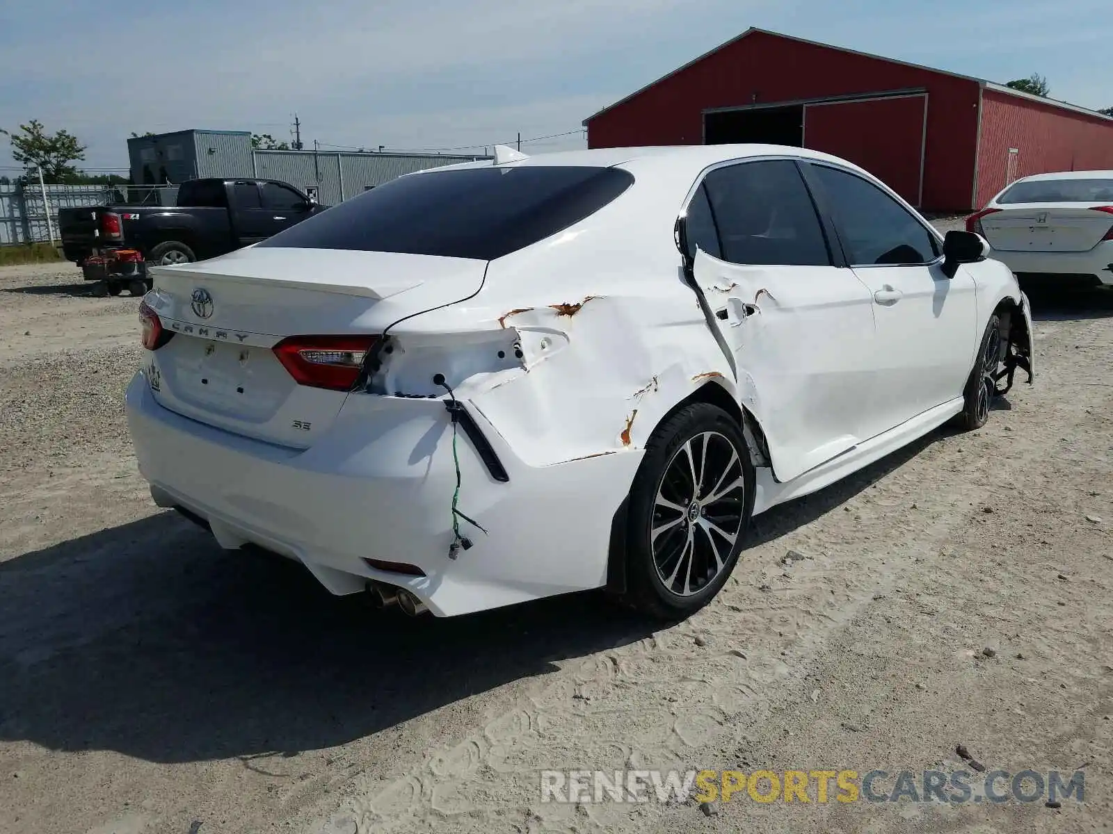 4 Photograph of a damaged car 4T1B11HK2KU747852 TOYOTA CAMRY 2019