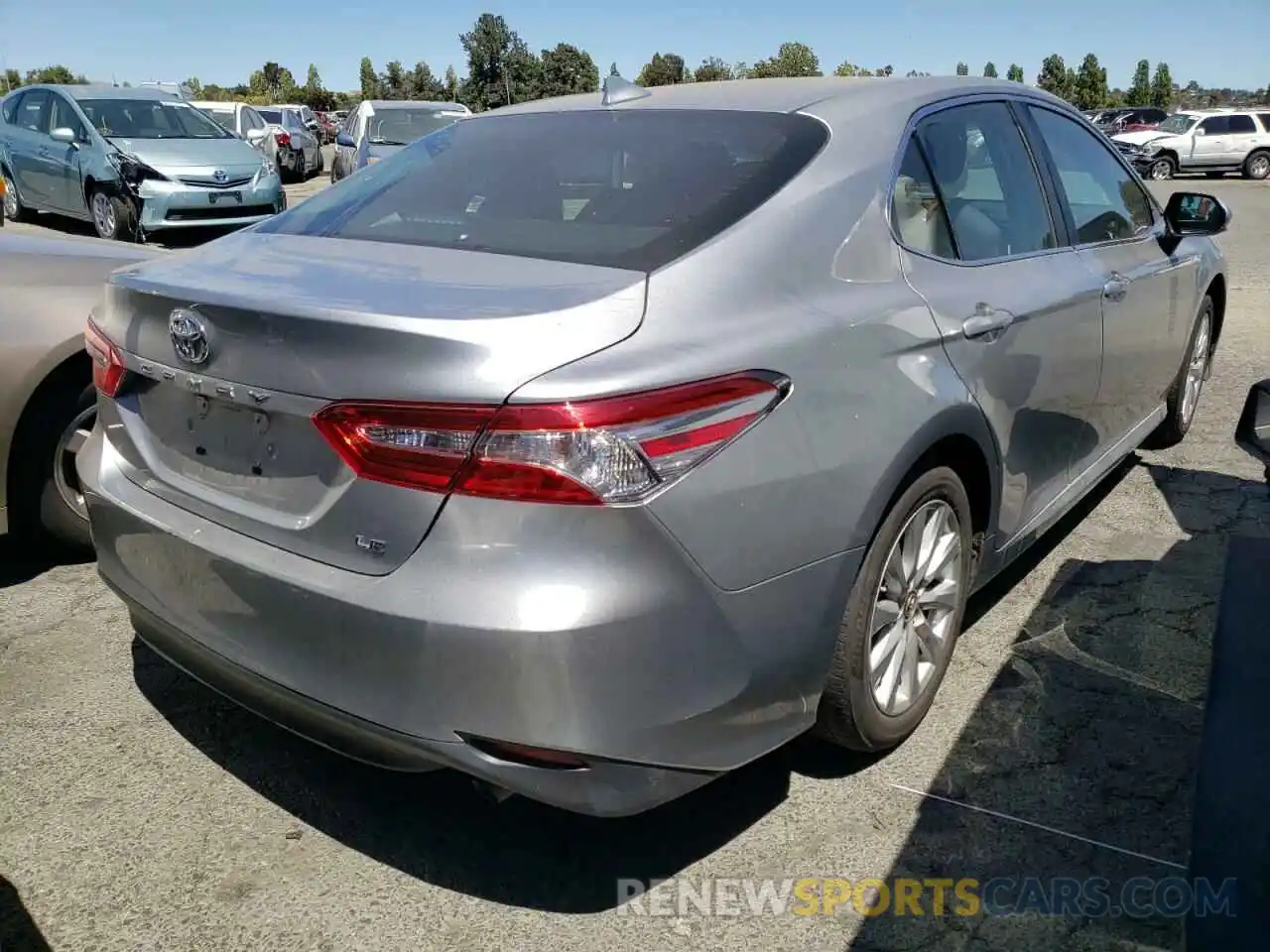 4 Photograph of a damaged car 4T1B11HK2KU757572 TOYOTA CAMRY 2019