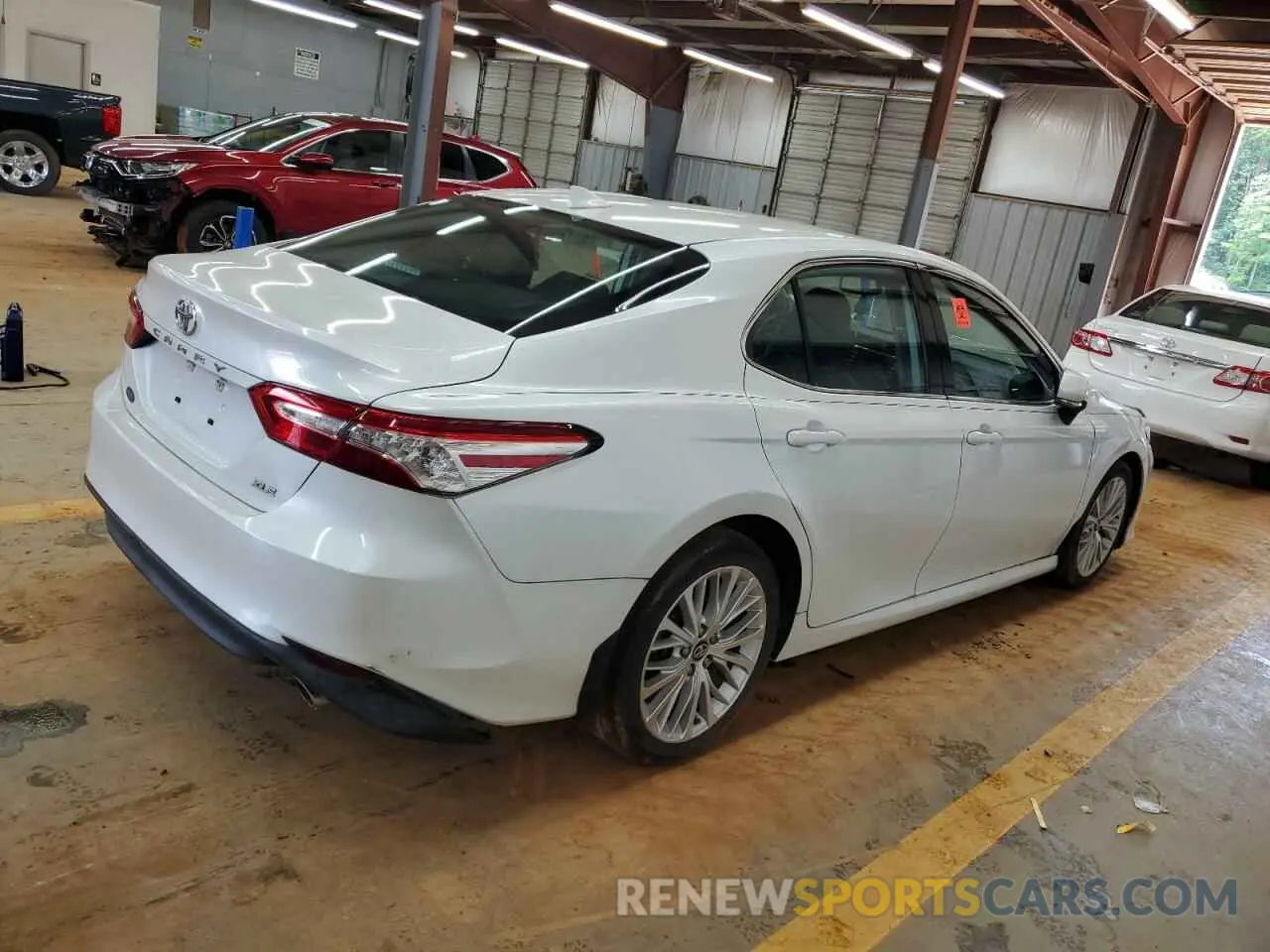 3 Photograph of a damaged car 4T1B11HK2KU761413 TOYOTA CAMRY 2019