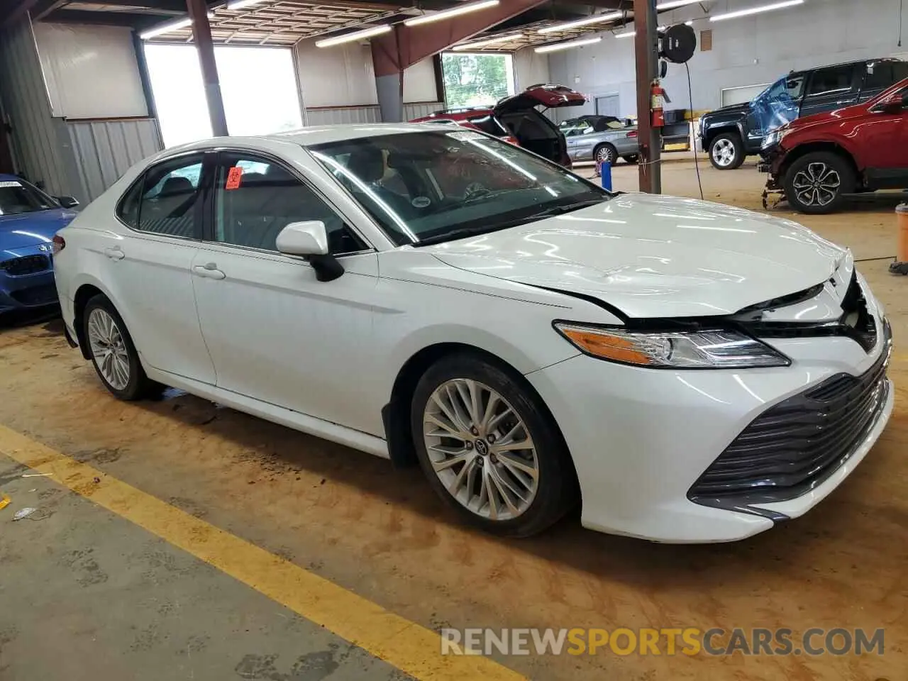 4 Photograph of a damaged car 4T1B11HK2KU761413 TOYOTA CAMRY 2019