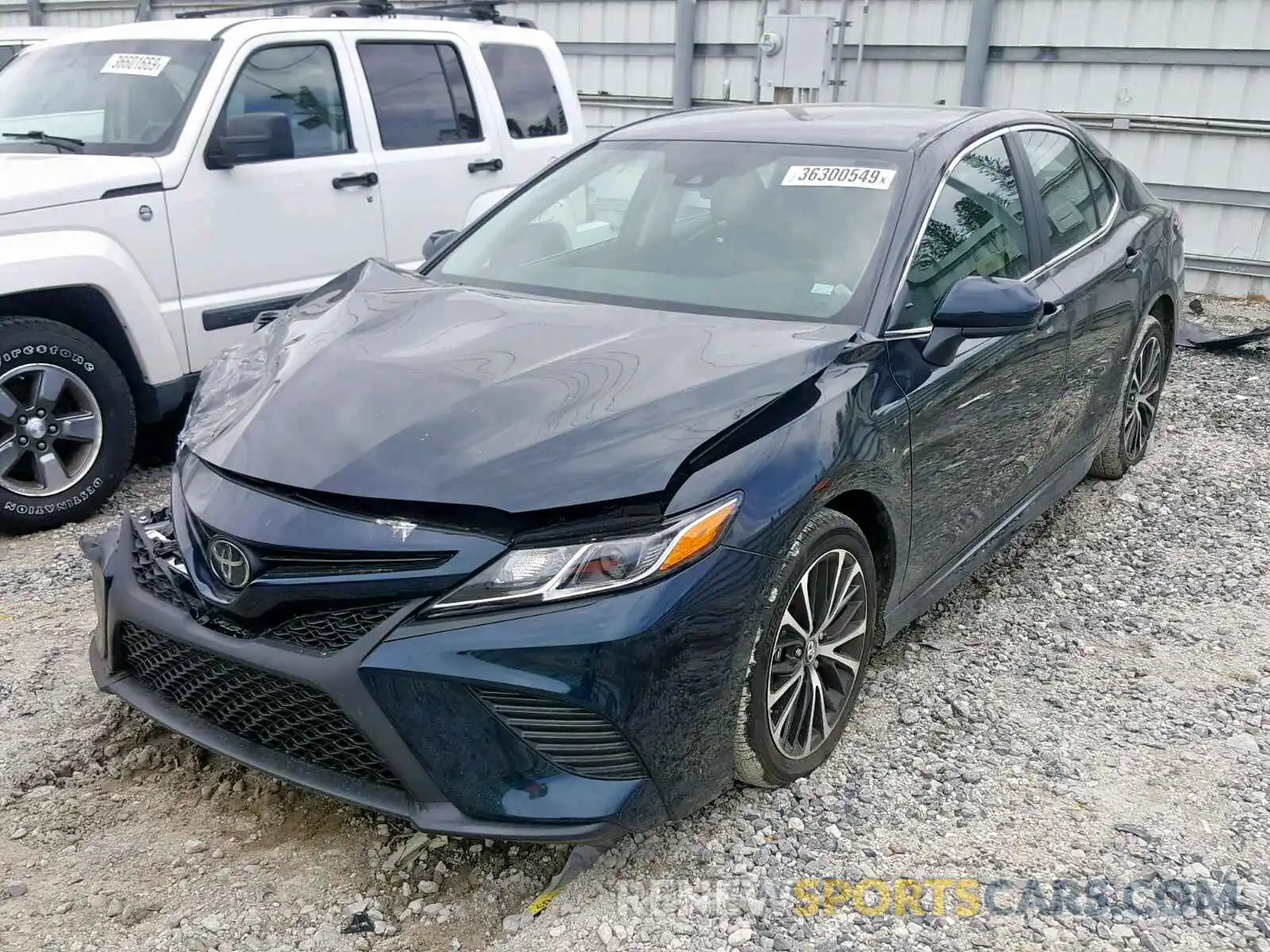 2 Photograph of a damaged car 4T1B11HK2KU785355 TOYOTA CAMRY 2019