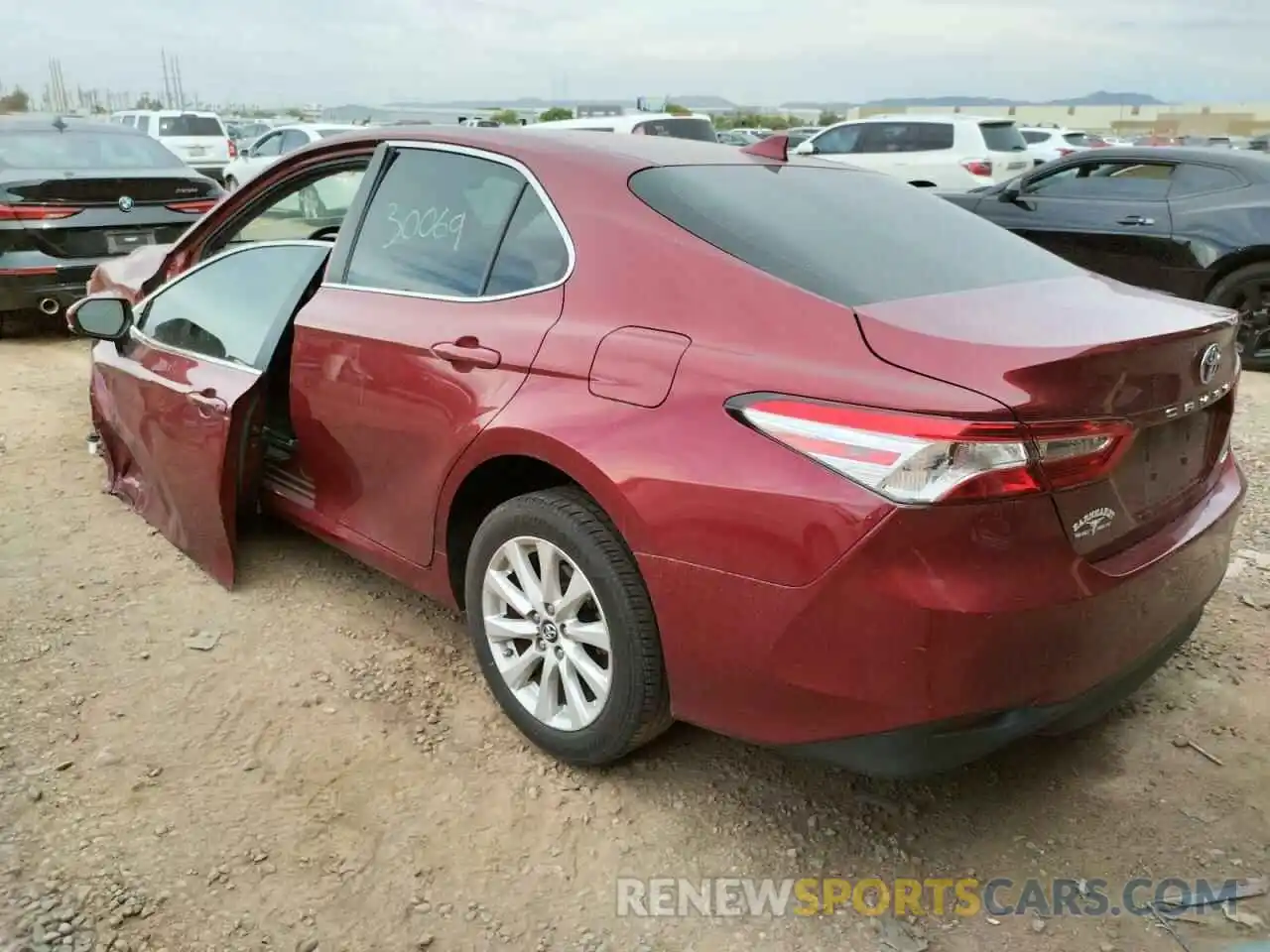 3 Photograph of a damaged car 4T1B11HK2KU786957 TOYOTA CAMRY 2019