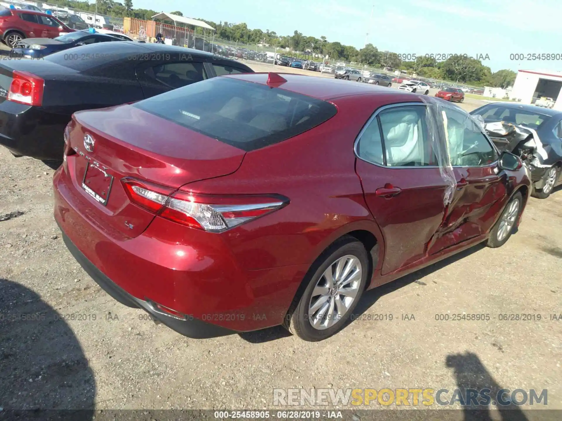 4 Photograph of a damaged car 4T1B11HK2KU795187 TOYOTA CAMRY 2019