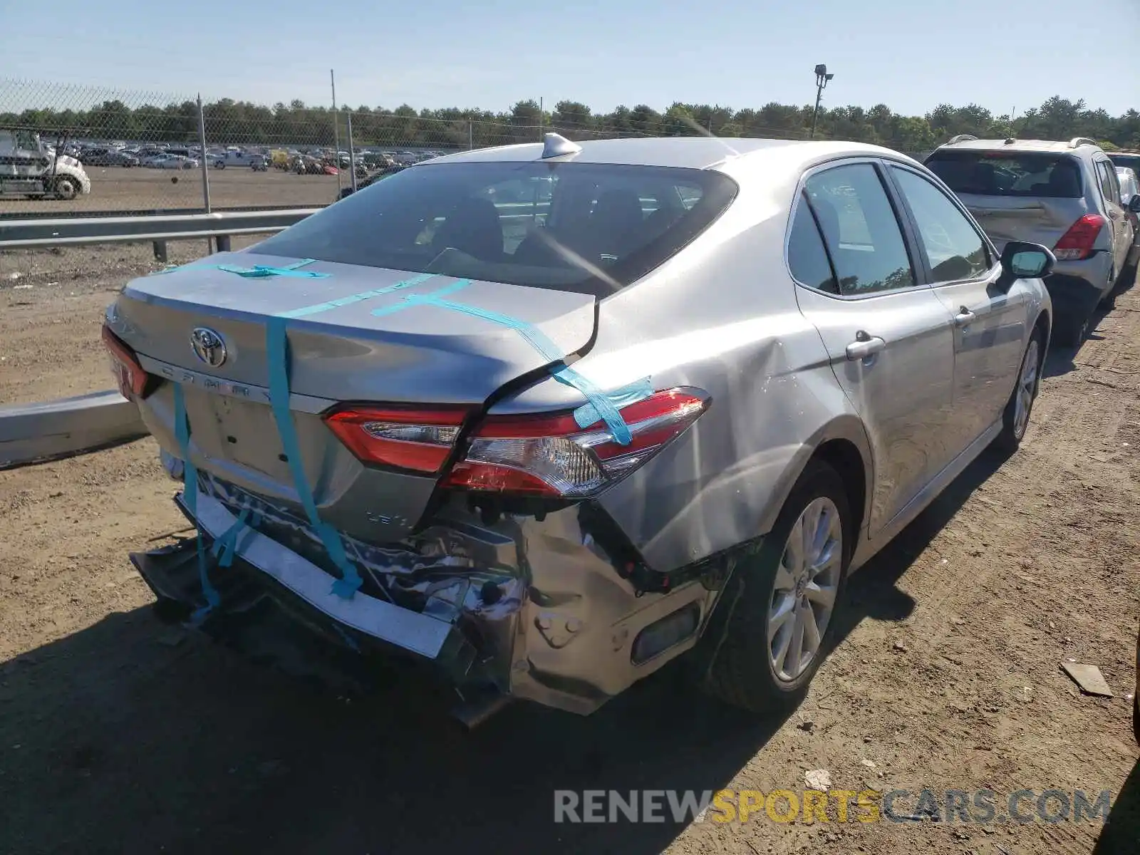 4 Photograph of a damaged car 4T1B11HK2KU802901 TOYOTA CAMRY 2019